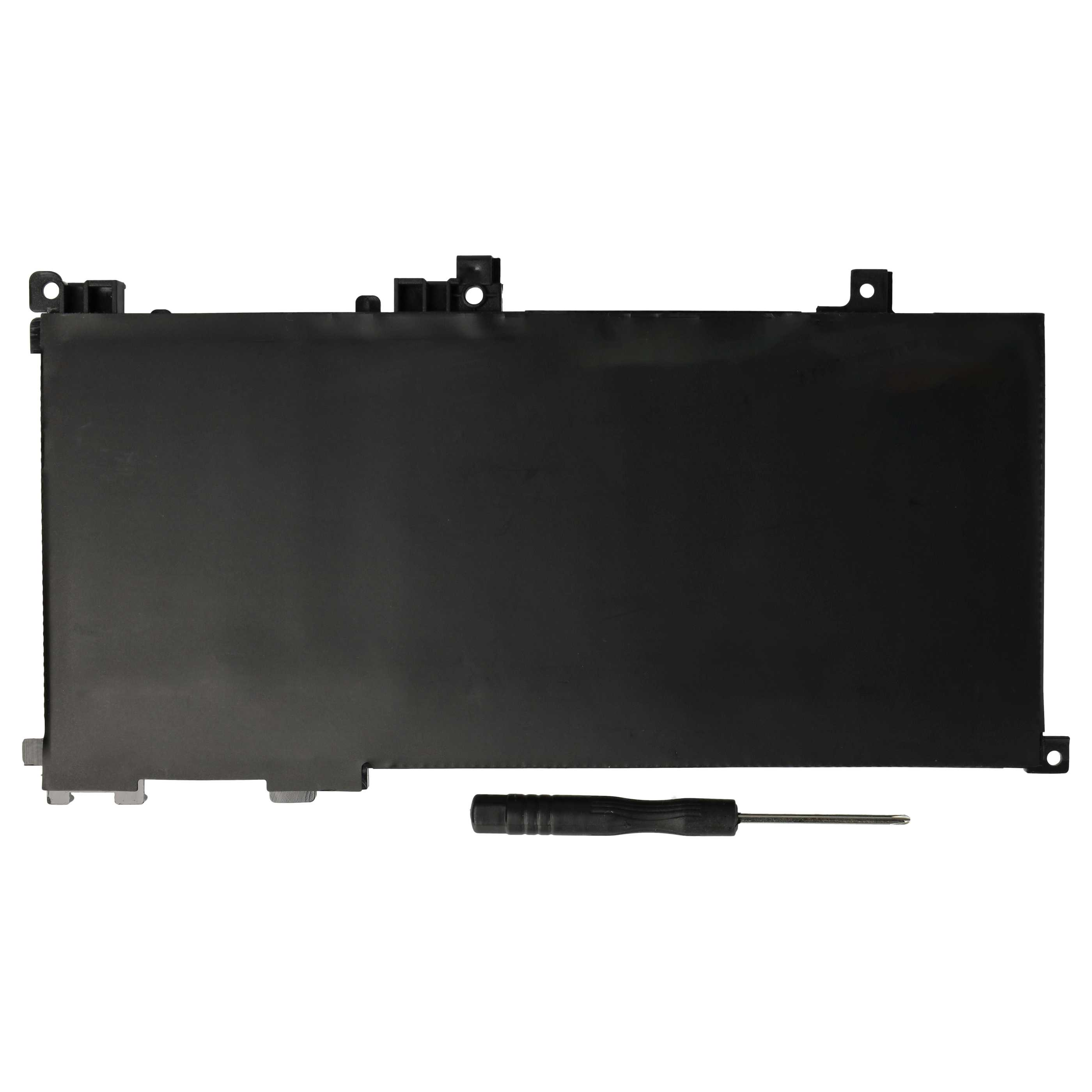 Ein schwarzer Laptop-Akku mit mehreren Anschlüssen und einem kleinen Schraubendreher auf weißem Hintergrund.