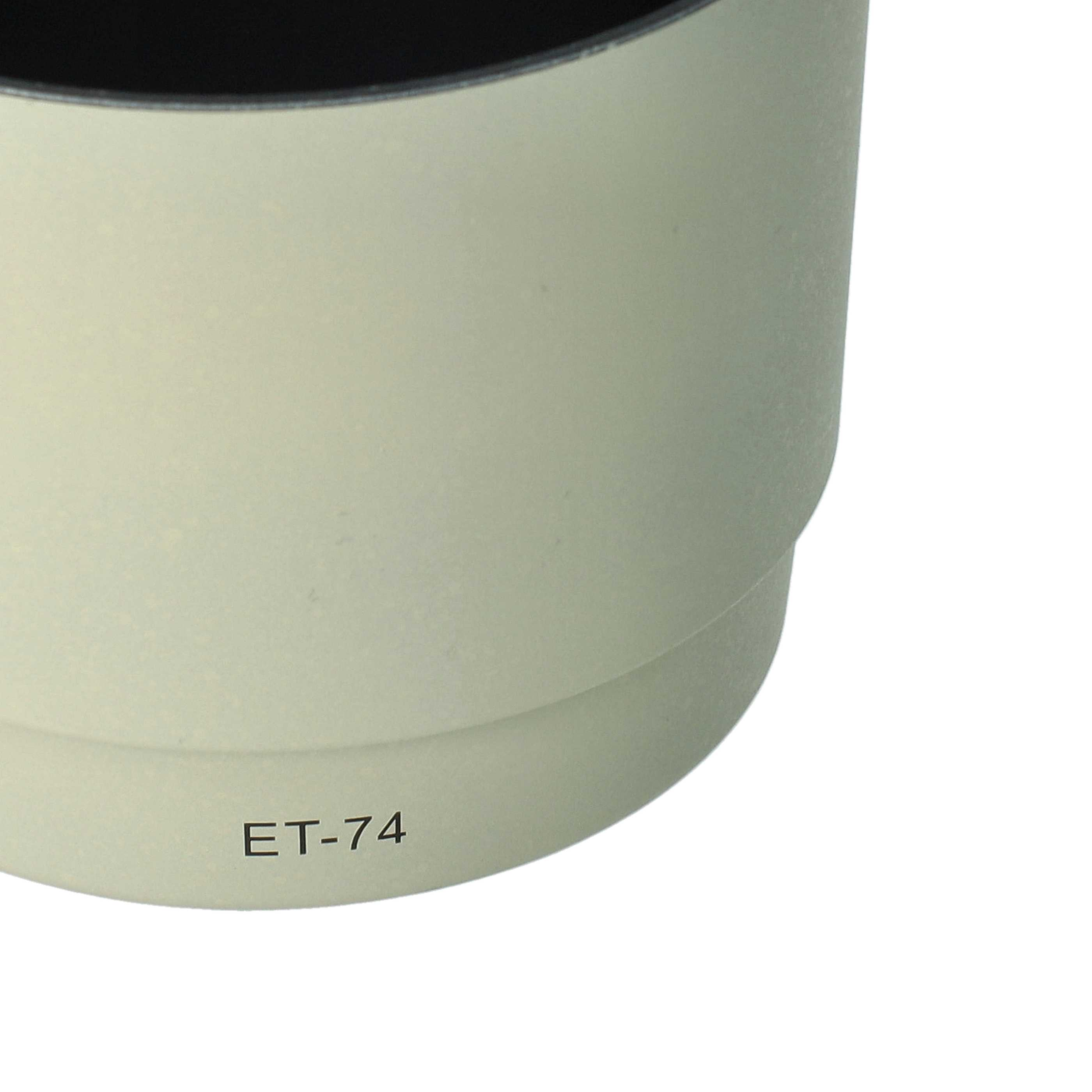 Eine hellbeige Objektiv-Gegenlichtblende vor weißem Hintergrund. Der Text 'ET-74' ist auf der Seite aufgedruckt.
