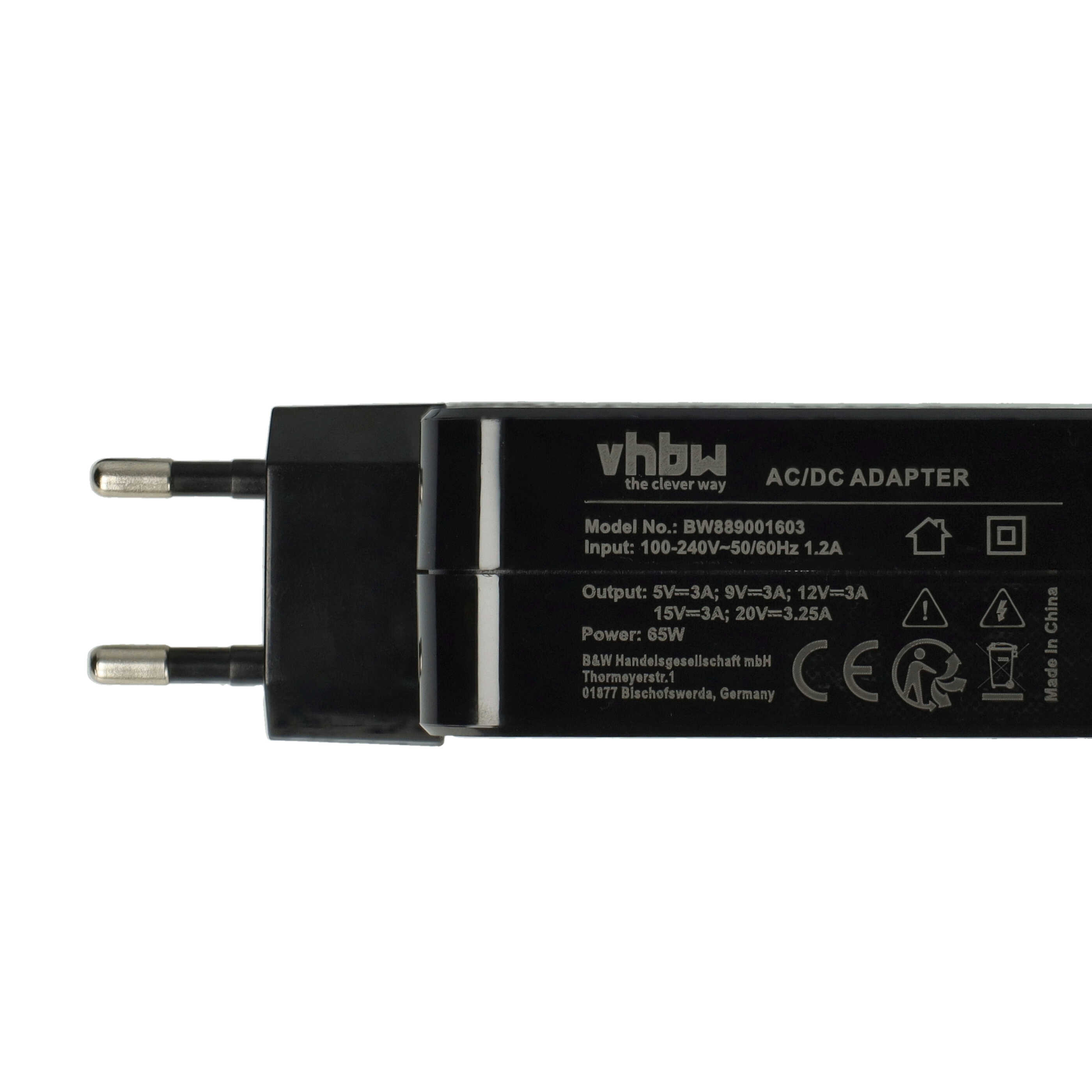 Ein schwarzer AC/DC-Adapter mit silbernen Stiften. Text: 'vhbw AC/DC ADAPTER' und technische Daten.