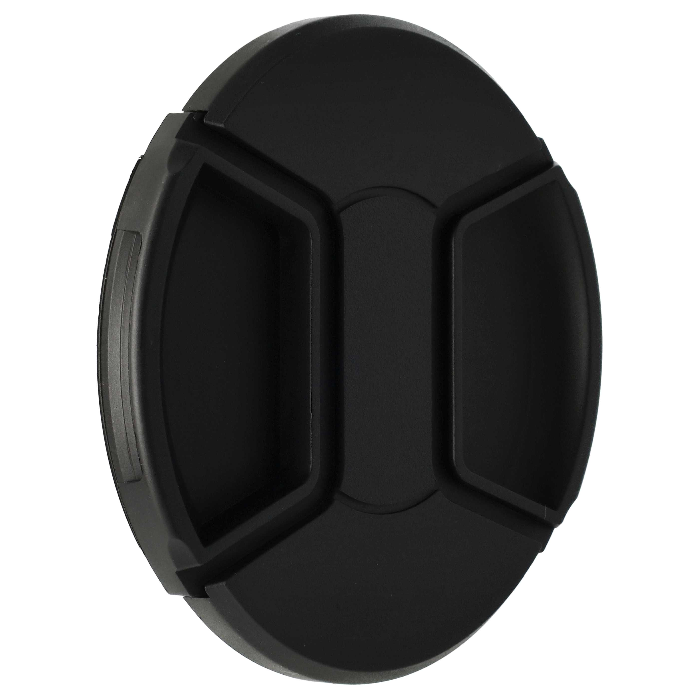 Eine schwarze Objektivkappe, kreisförmig, mit strukturierter Kante und einem zentralen, eingesetzten Design.