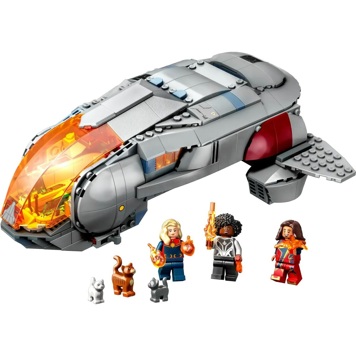 Uzay gemisi, üç minifigür ve üç kedi figürü içeren Lego seti. Uzay gemisi, turuncu bir kokpite sahip gri renktedir.