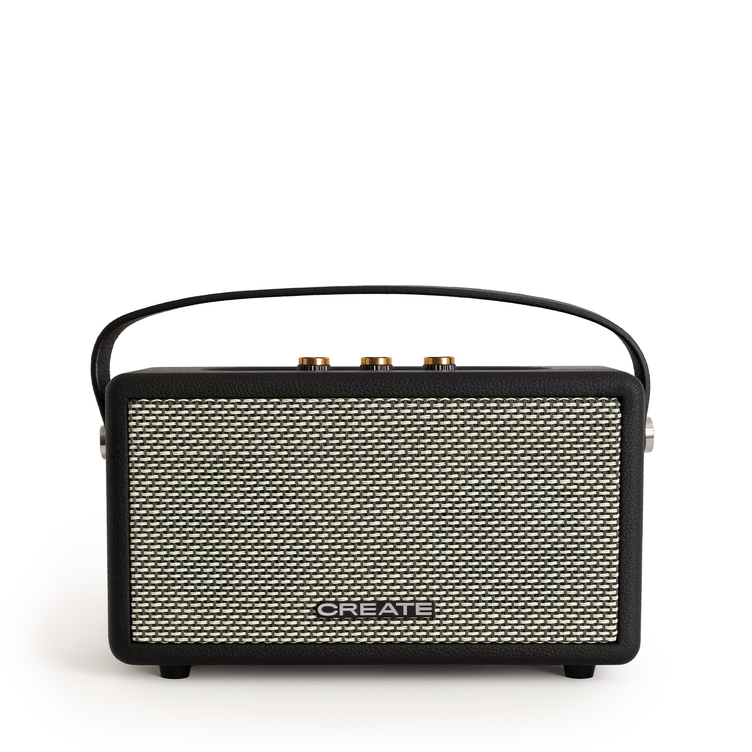 Un altavoz blanco y negro con asa. El altavoz tiene una rejilla frontal y perillas doradas en la parte superior. Está sobre una superficie blanca.