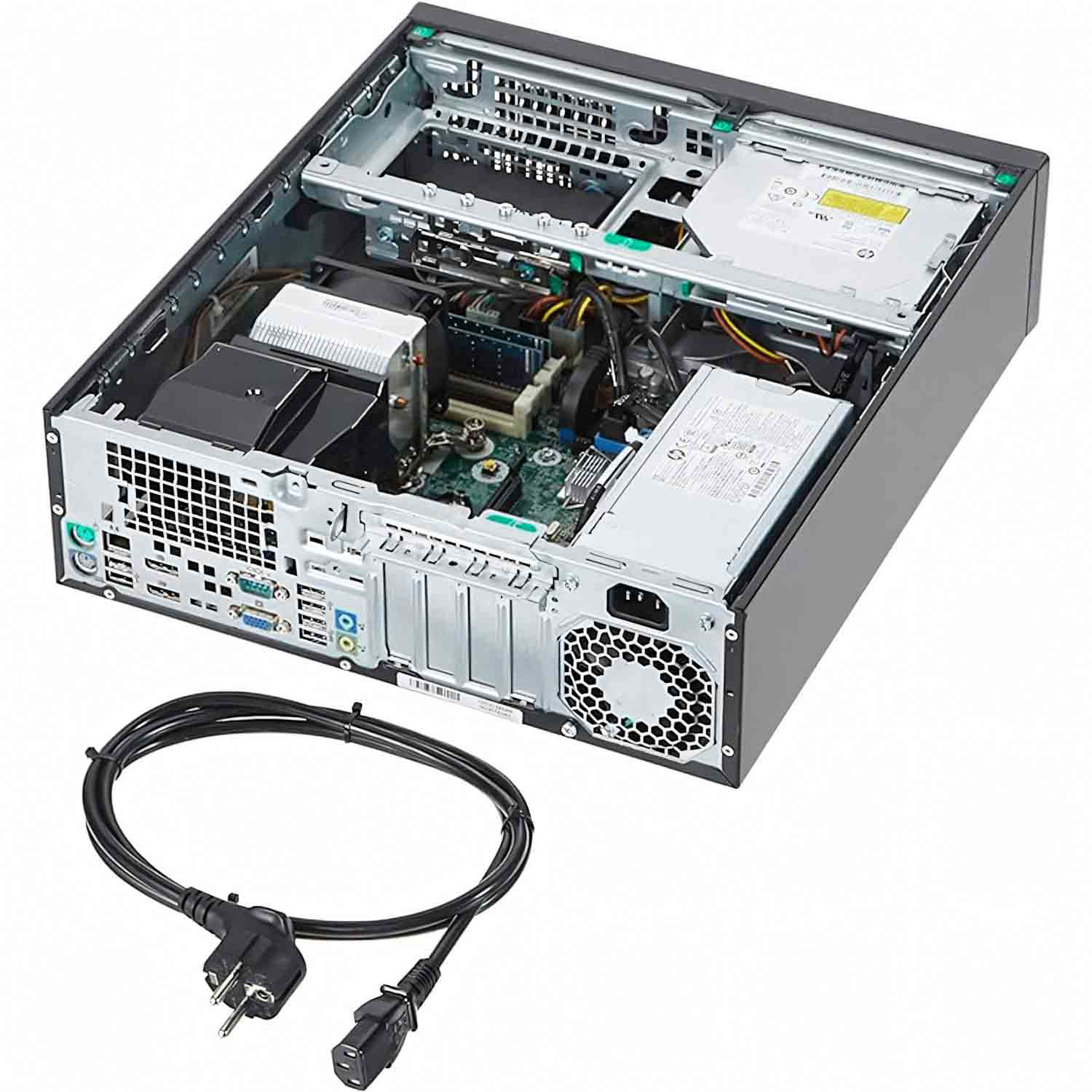 Carcasa de computadora abierta con componentes internos visibles. Un cable de alimentación negro está en primer plano. La carcasa está abierta, revelando hardware.