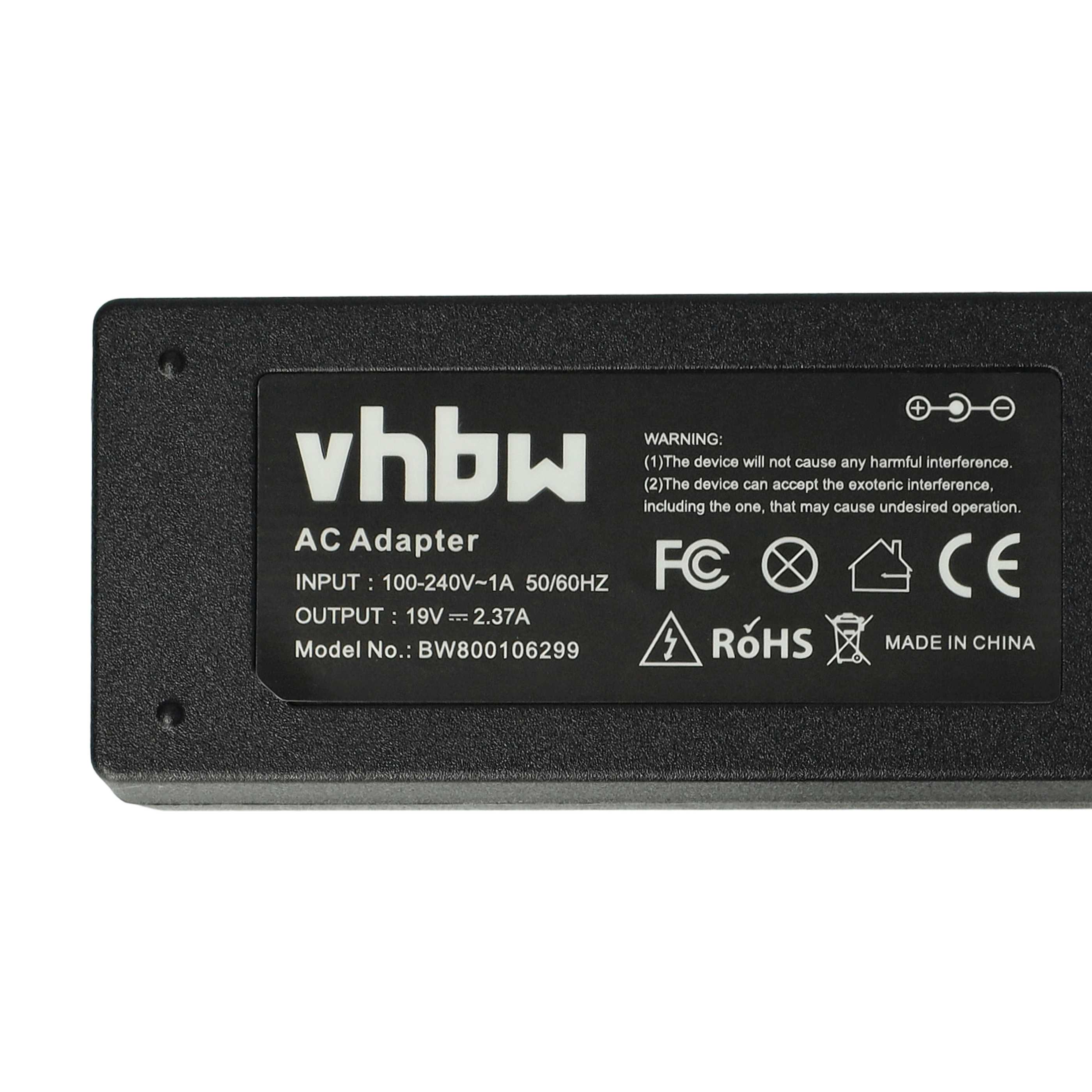 Ein schwarzes AC-Netzteil mit weißem Text. Es hat den Markennamen 'vhbw', Eingangs-/Ausgangsspezifikationen und Sicherheitssymbole.