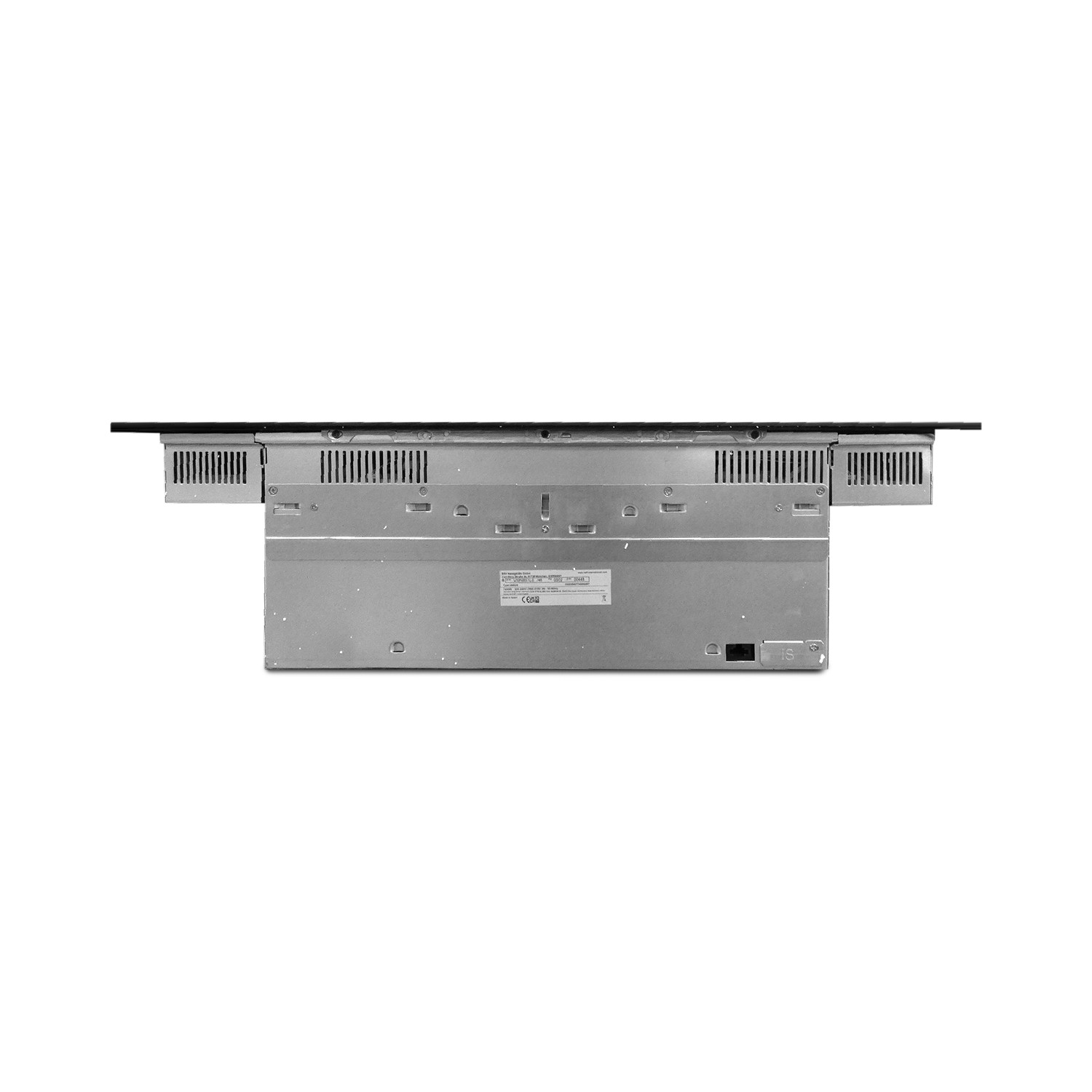 Onderkant van een zwart en grijs inductiekooktoestel. Het heeft ventilatieopeningen, een metalen behuizing en een productlabel.