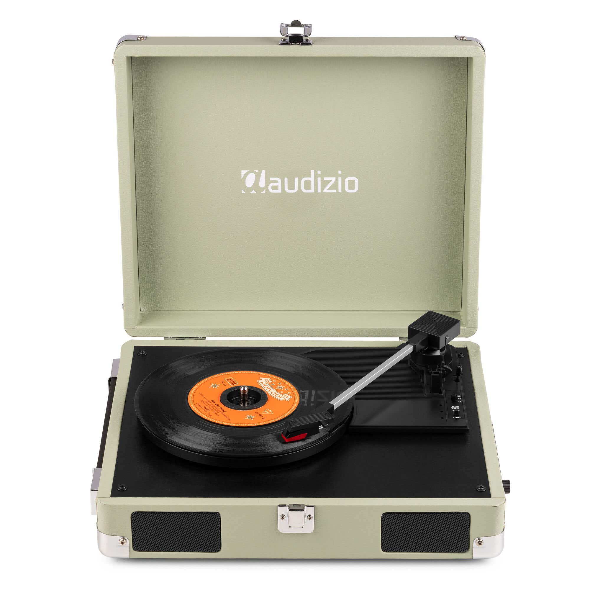 An open, retro-style record player with a black record in place. The player is light green with a black base and silver accents.