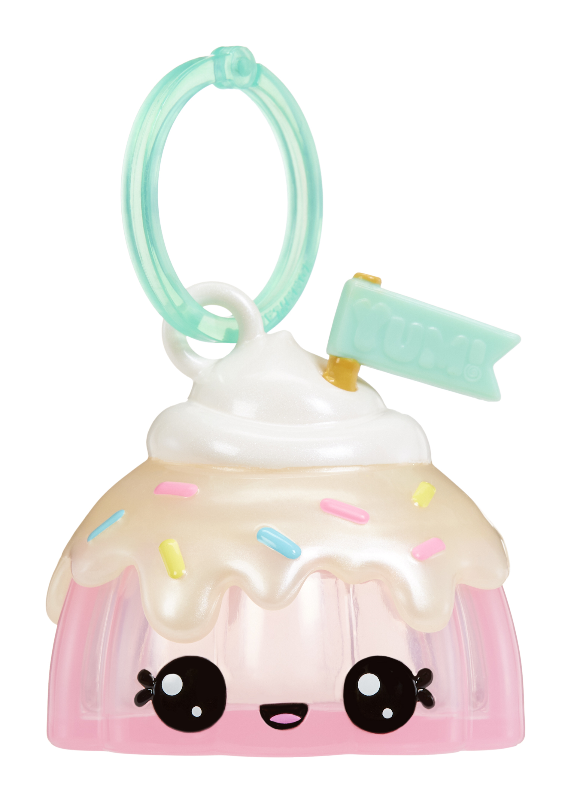 Zabawka w kształcie babeczki z twarzą i posypką. Ma miętowy brelok i flagę z napisem Yum!