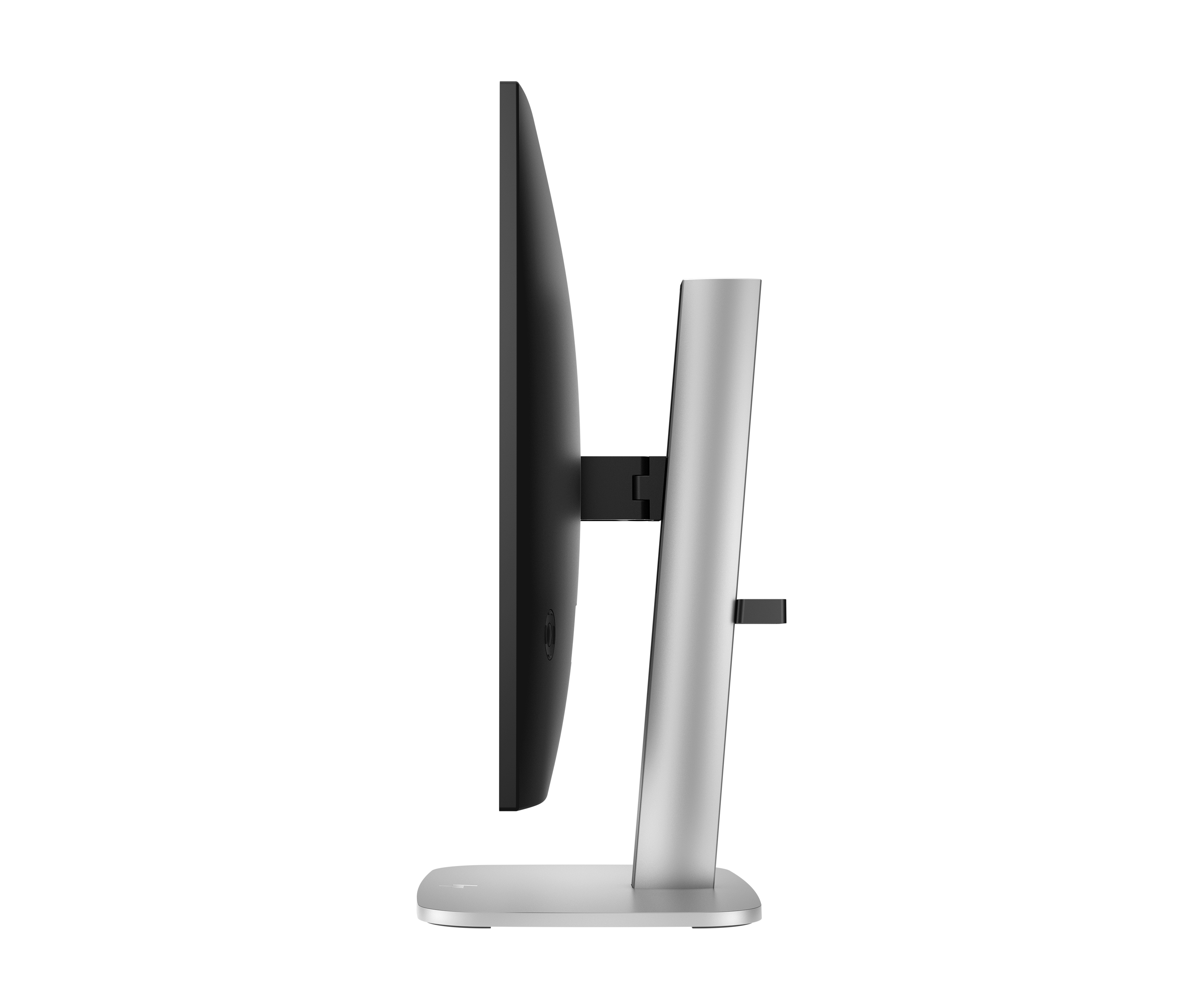 Widok z boku monitora komputera. Jest czarny, ze srebrną podstawą. Tło jest białe.