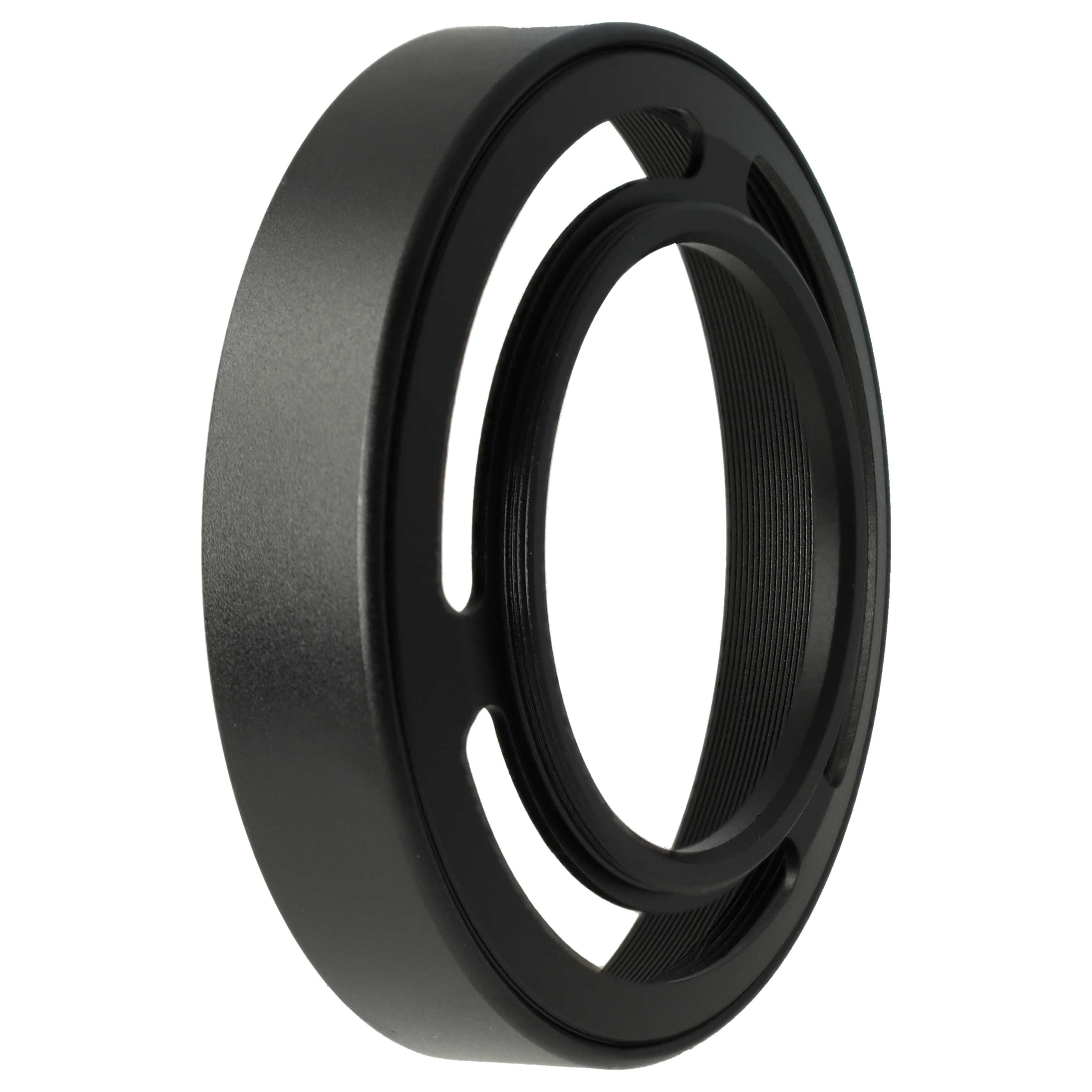 Eine schwarze Sonnenblende. Sie ist kreisförmig mit einem kleineren Innenring. Löcher und Rillen sind sichtbar. Weißer Hintergrund.