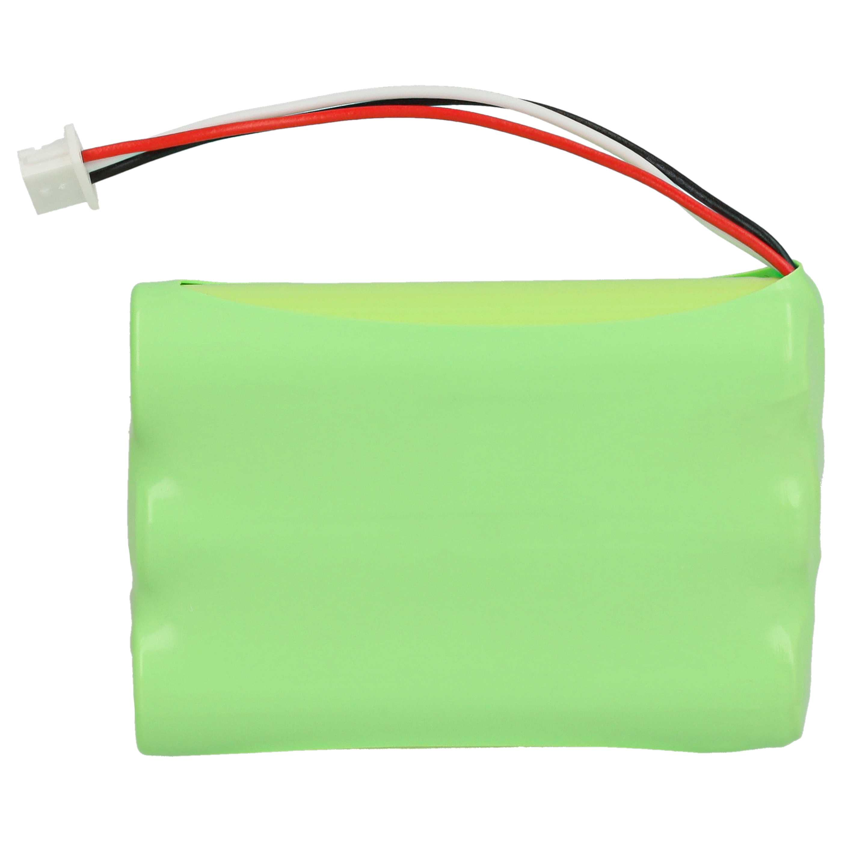 Grüne Batterie mit weißen, roten und schwarzen Drähten, die sich von oben erstrecken. Ein weißer Stecker ist an den Drähten befestigt.