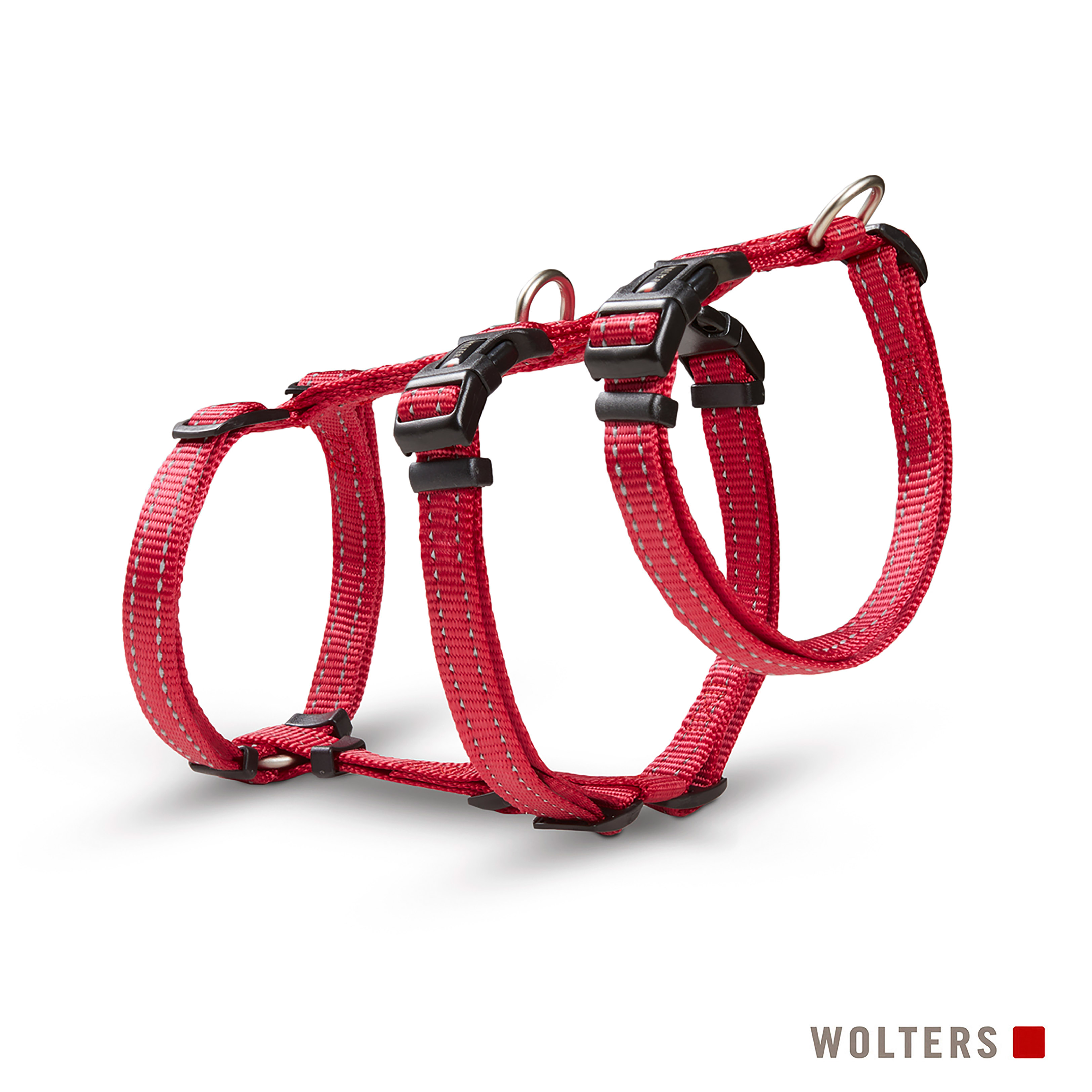 Rotes Hunde-Geschirr auf weißem Hintergrund. Mit reflektierenden Nähten und schwarzen Verschlüssen.