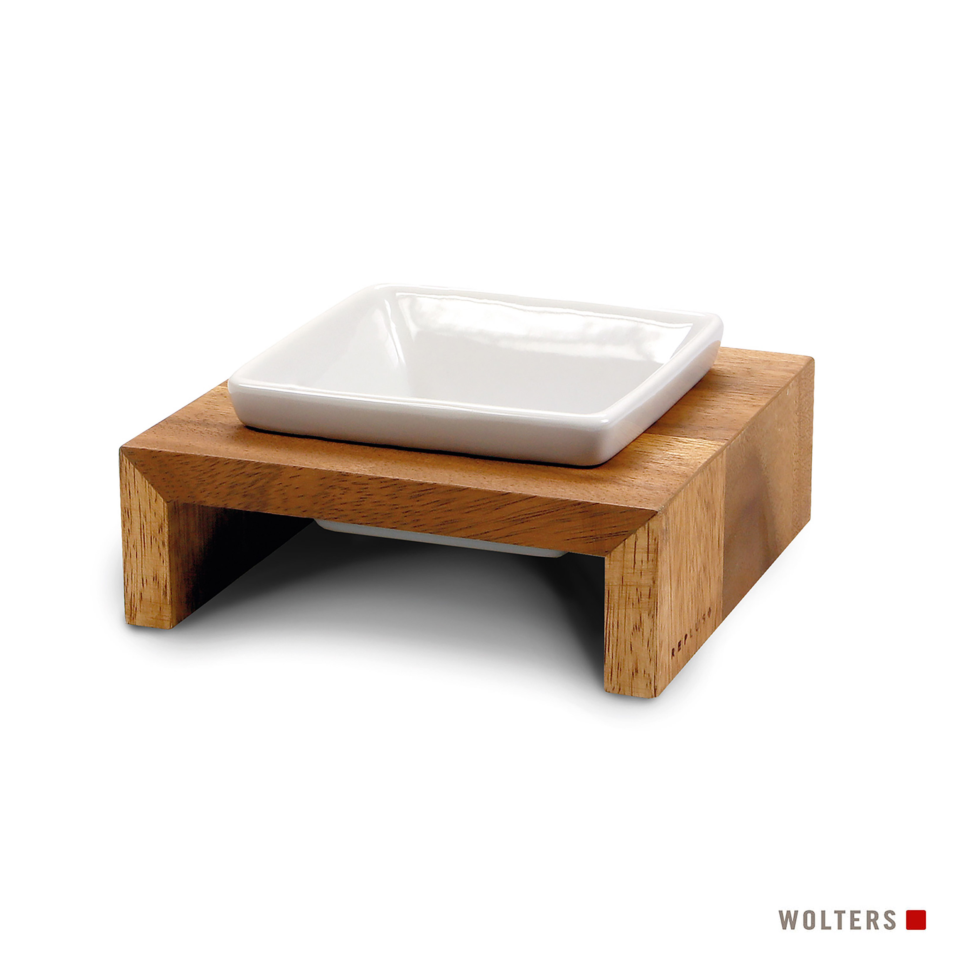 Eine weiße quadratische Schüssel steht auf einem Holzsockel. Der Sockel hat eine rechteckige Form mit hellerer Farbe.