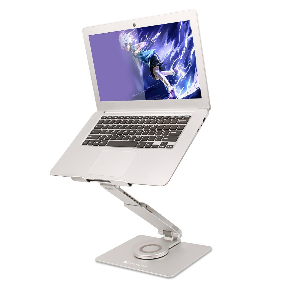 Srebrny laptop na podstawce wyświetla postać z anime. Podstawka jest srebrna i ma okrągłą podkładkę ładującą.