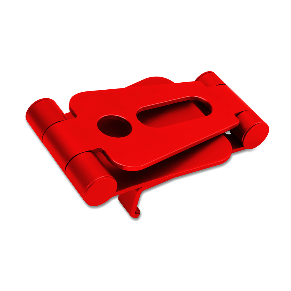 Un supporto per telefono rosso piegato su sfondo bianco. Ha una forma rettangolare con bordi arrotondati e supporti cilindrici.