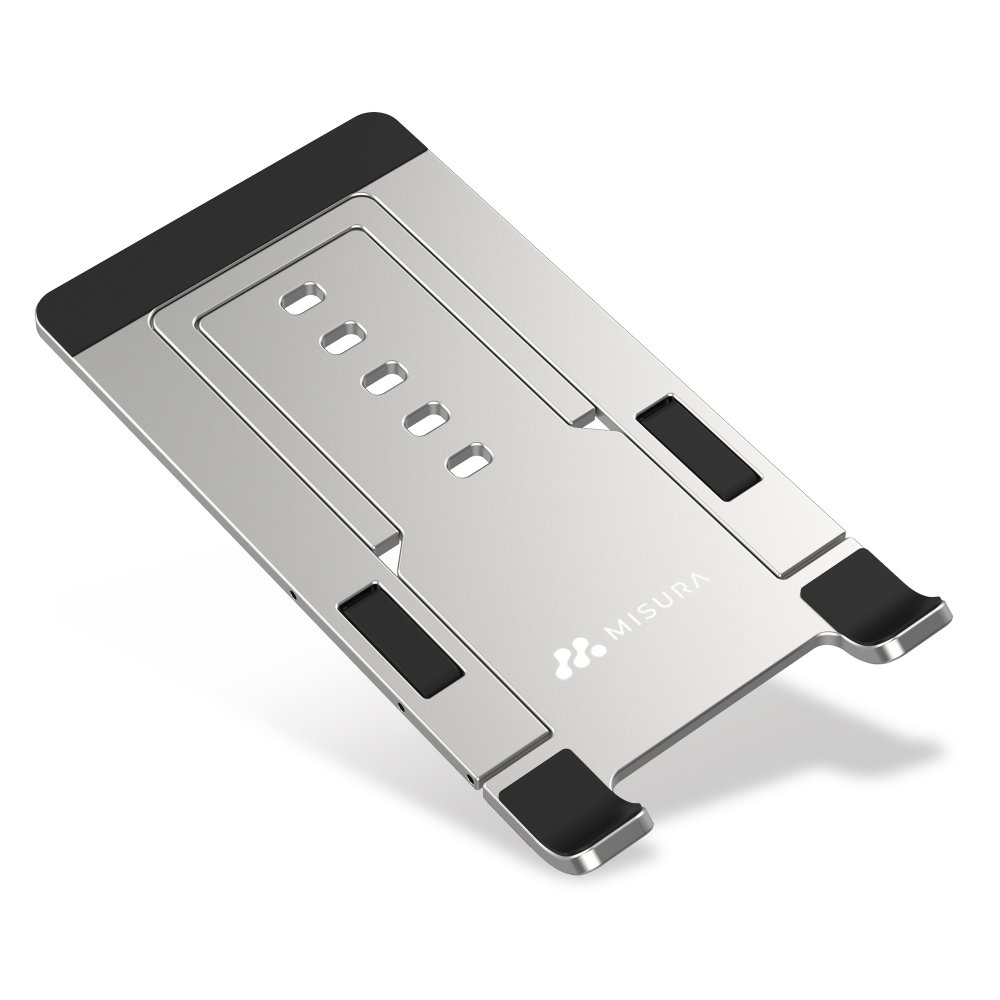 Un supporto per laptop argentato con inserti neri. Presenta il marchio 'MISURA'. Il supporto è su sfondo bianco.