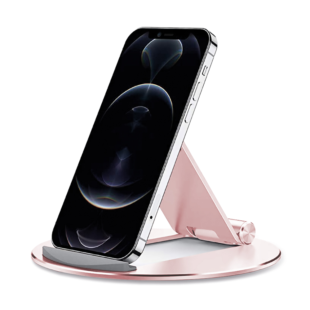 Un supporto per telefono color oro rosa tiene un iPhone con schermo nero. Il supporto ha una base circolare e un braccio di supporto.