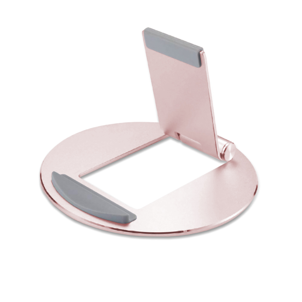 Un supporto per telefono oro rosa con base circolare e supporto verticale. Cuscinetti in gomma grigia sul supporto.