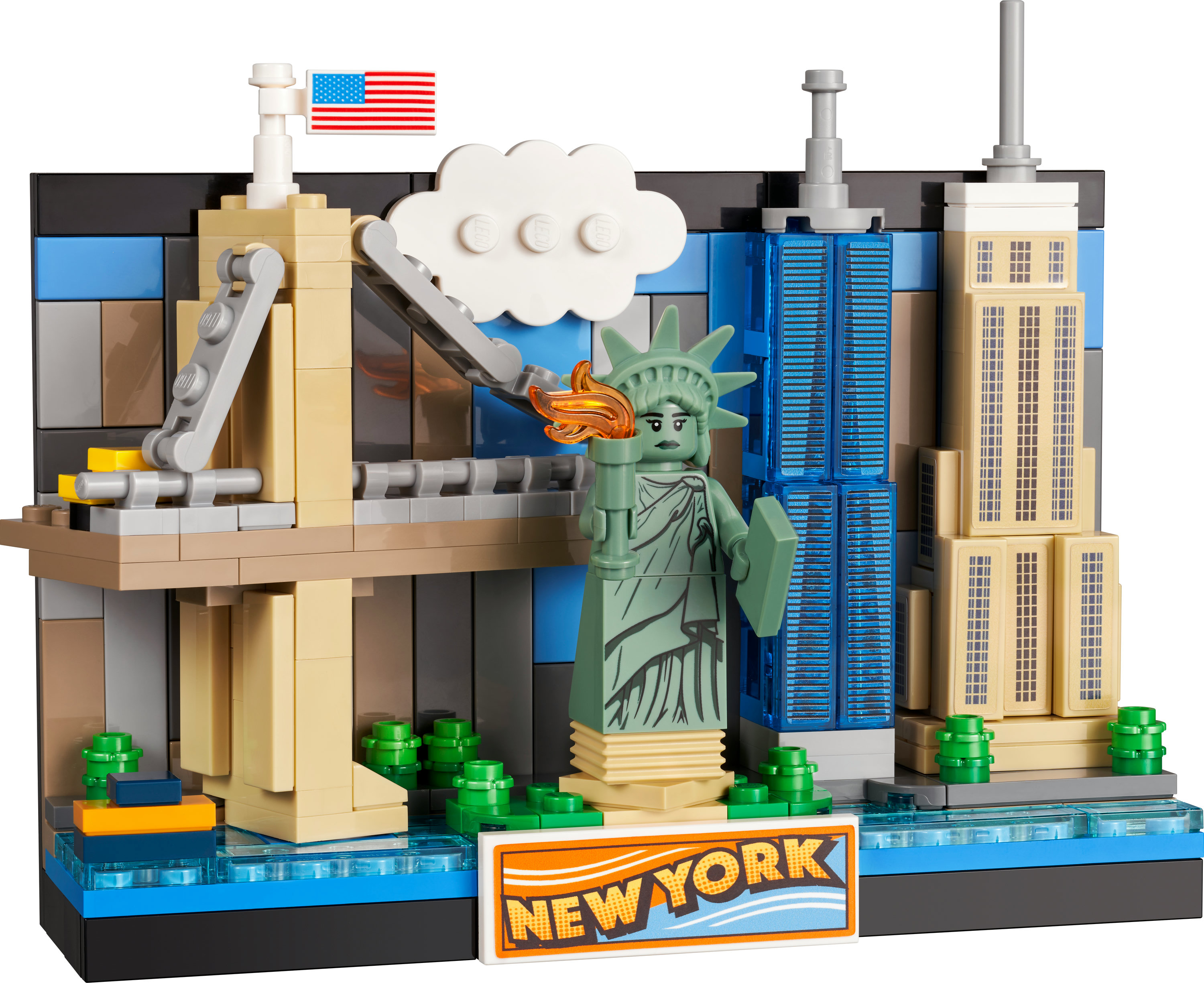Modello Lego di New York City. Statua della Libertà, grattacieli, ponte e bandiera. Il cartello dice 'NEW YORK'.