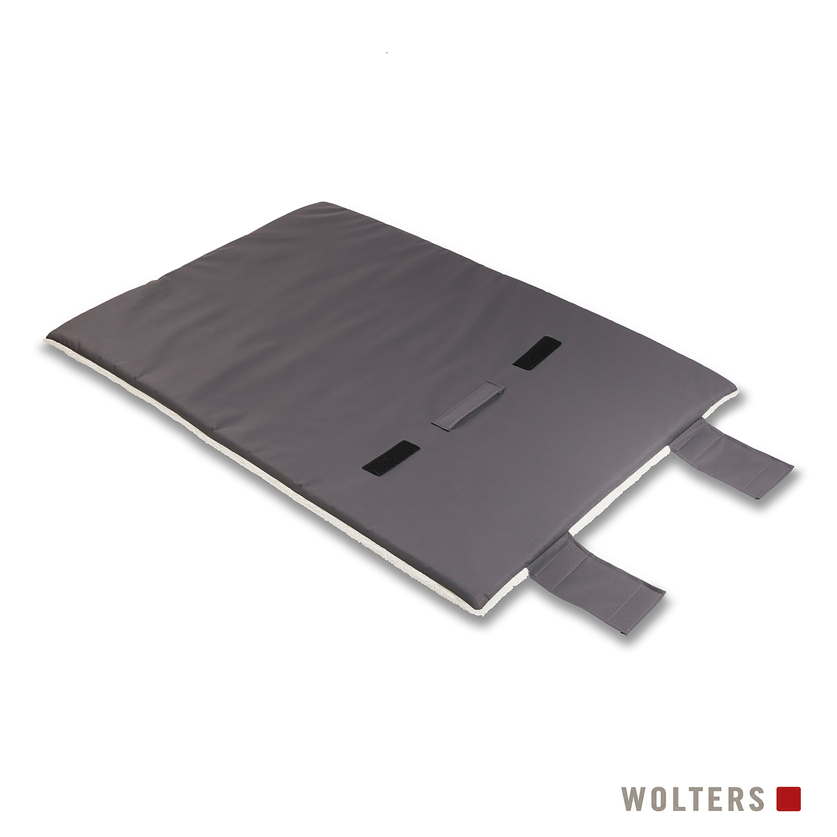 Ein graues Haustierbett mit weißem, flauschigem Futter. Es hat Riemen und Klettverschlüsse. Der Markenname 'WOLTERS' steht unten.