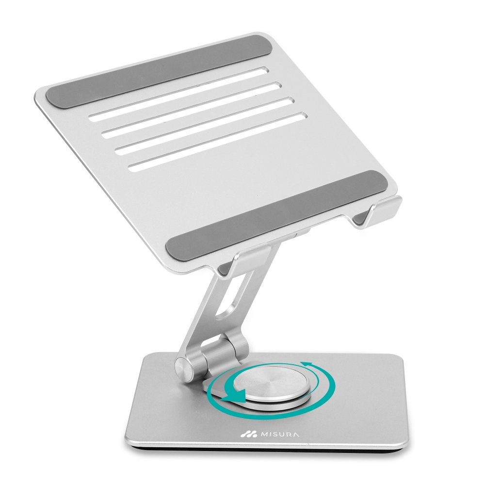Un supporto per laptop argentato con cuscinetti in gomma grigia. Ha un braccio regolabile e una base girevole. Il marchio 'MISURA' è visibile.