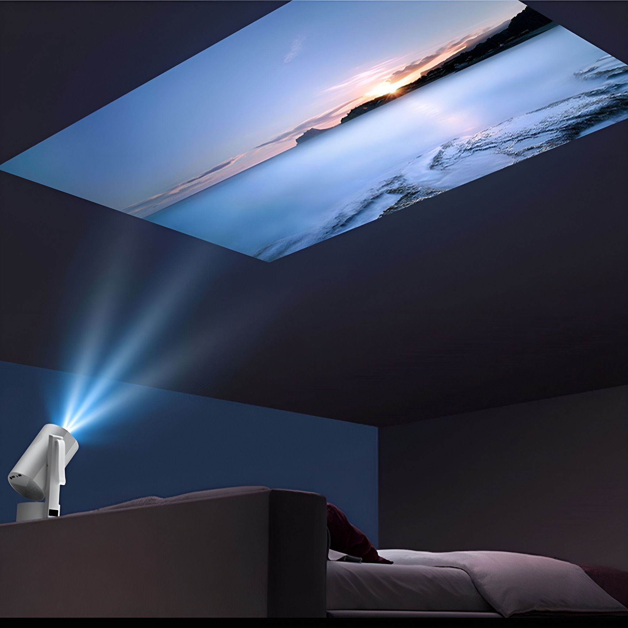 Ein Projektor projiziert eine Landschaft an die Decke. Im Vordergrund ist ein Bett. Die Decke zeigt einen Sonnenuntergang über einer blauen Landschaft.