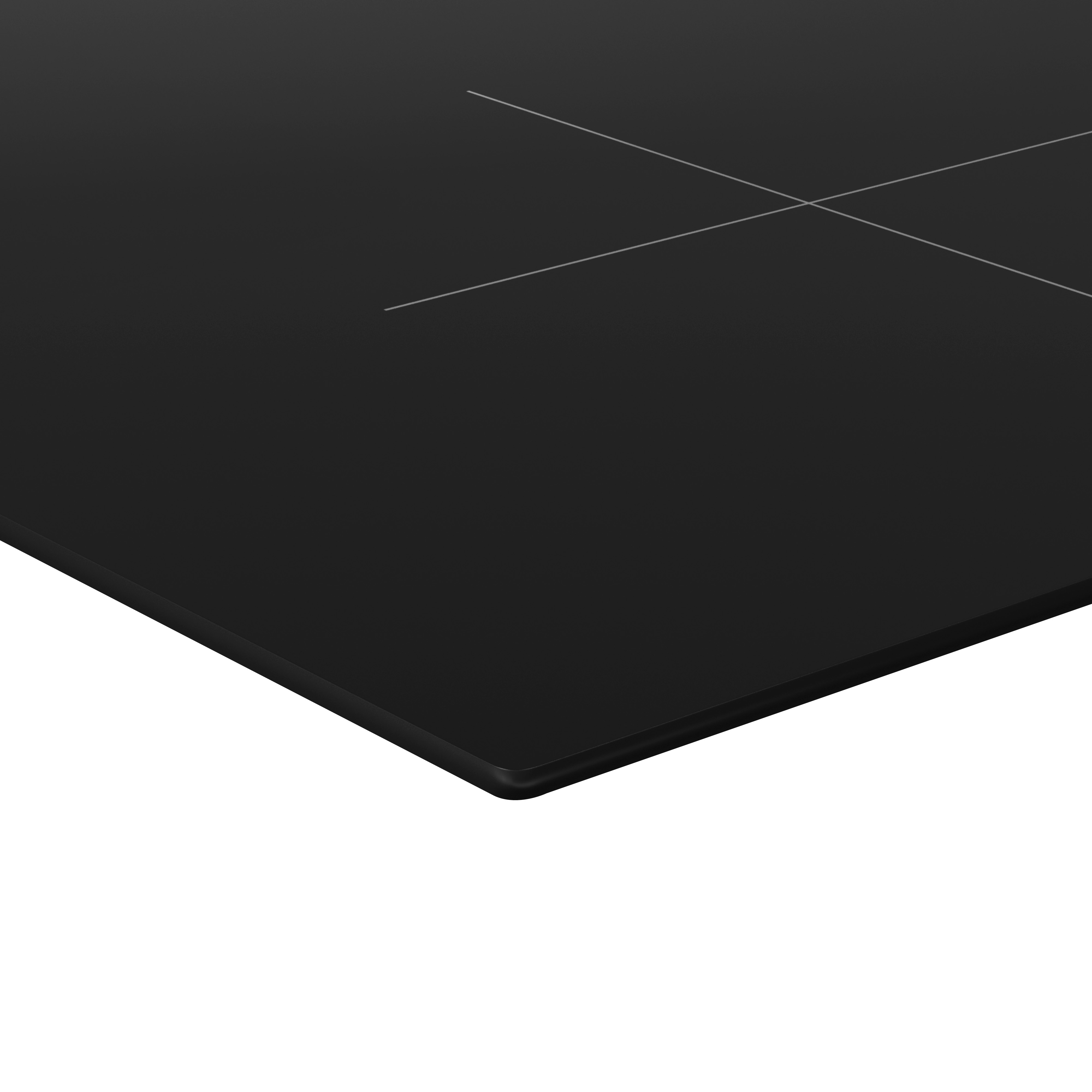 A close-up of a black induction cooktop with white cross markings, angled view. White background.