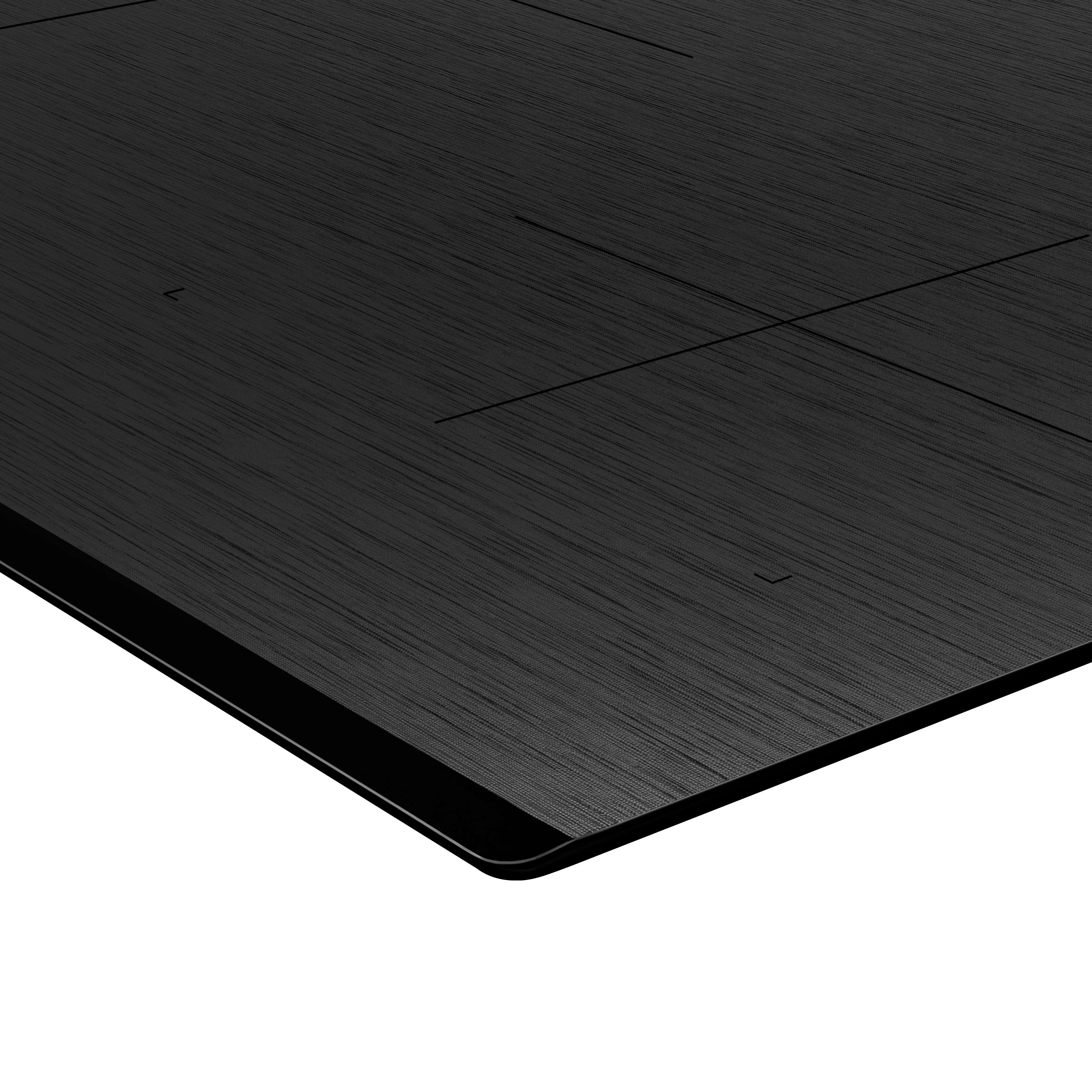 A black induction cooktop. The surface has a textured pattern and a black border. Lines indicate cooking zones.