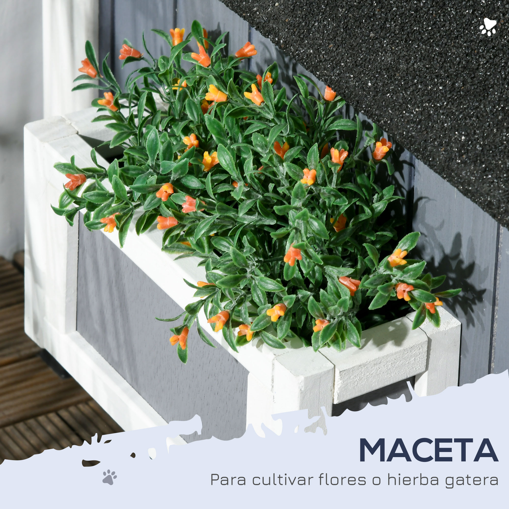 Una maceta blanca y gris con plantas verdes y flores naranjas. El fondo es gris con una superficie texturizada.