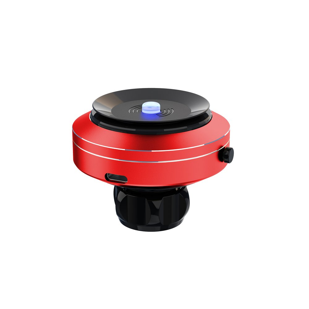 Un altoparlante rosso e nero con una parte superiore nera e una luce blu. Ha un design arrotondato e poggia su una base nera.