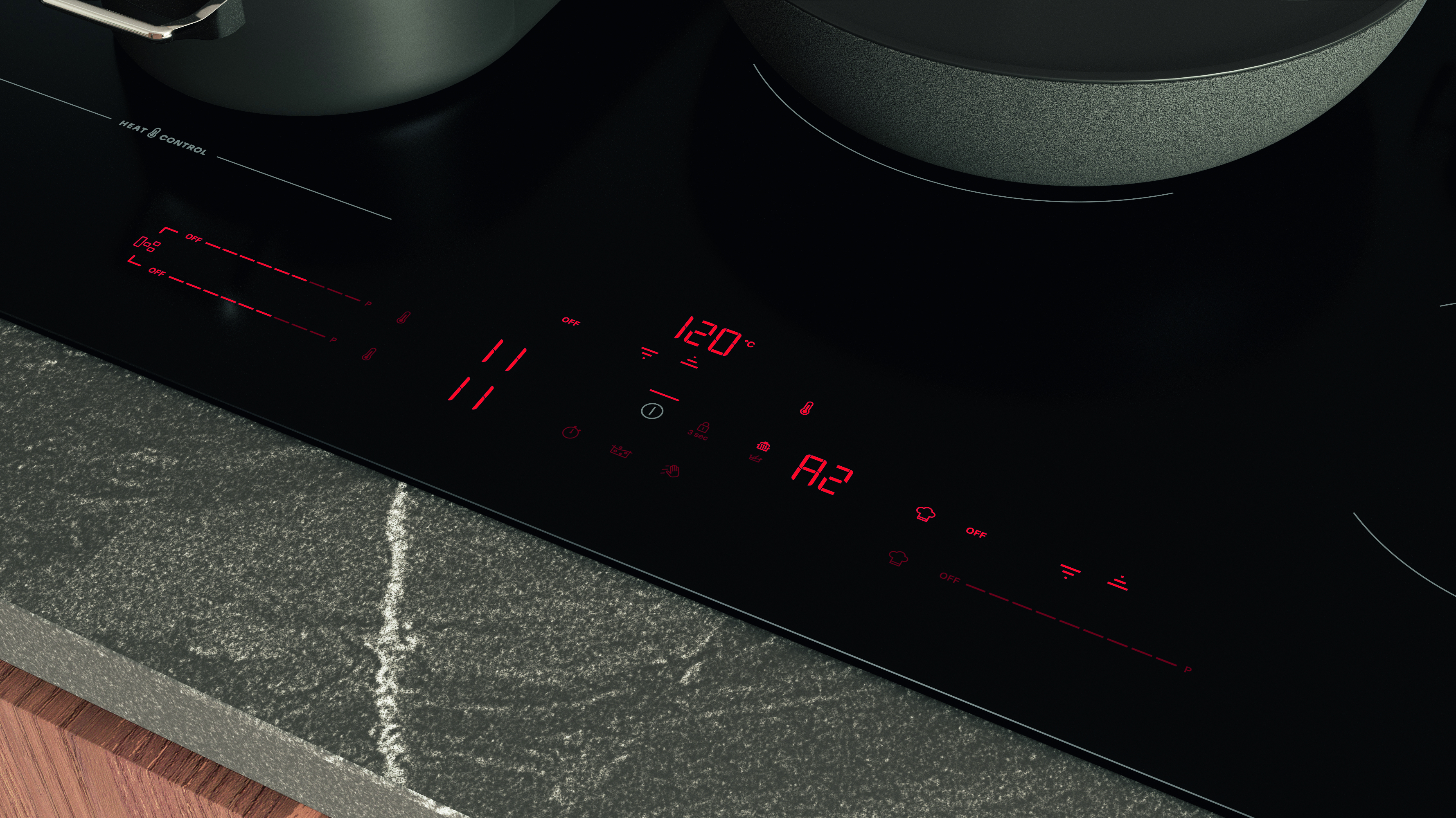 Un piano cottura a induzione nero con display digitale rosso. Due pentole sopra. I display mostrano la temperatura, i livelli di potenza e il timer.