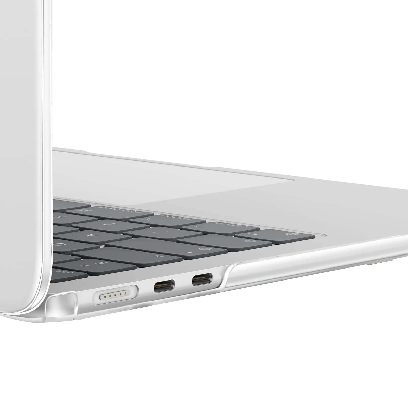 Primo piano di un laptop argentato con tastiera nera. Il lato mostra le porte e la cerniera. Sfondo bianco.