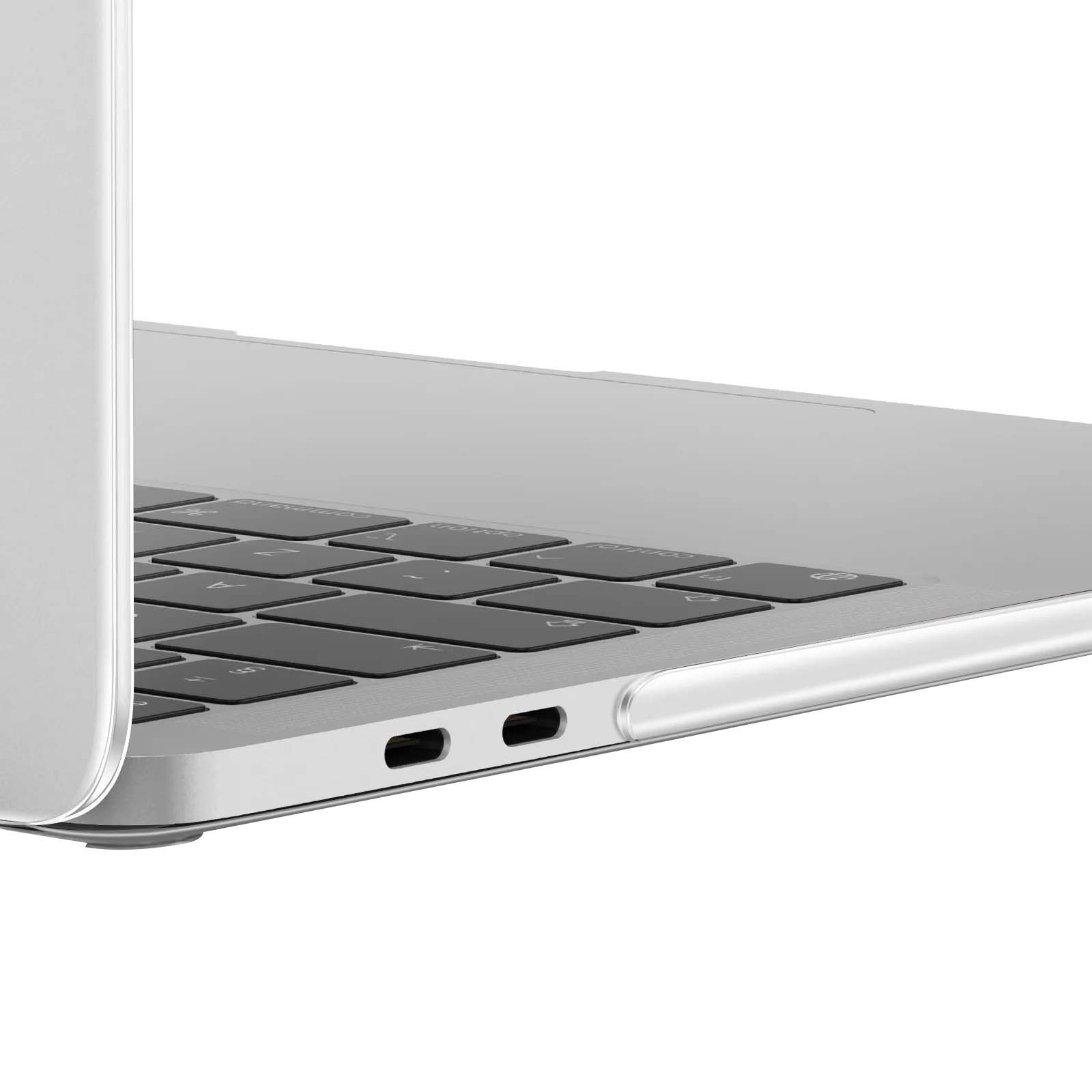 Primo piano di un laptop argentato. Focus sulla tastiera con tasti neri. Due porte visibili sul lato.