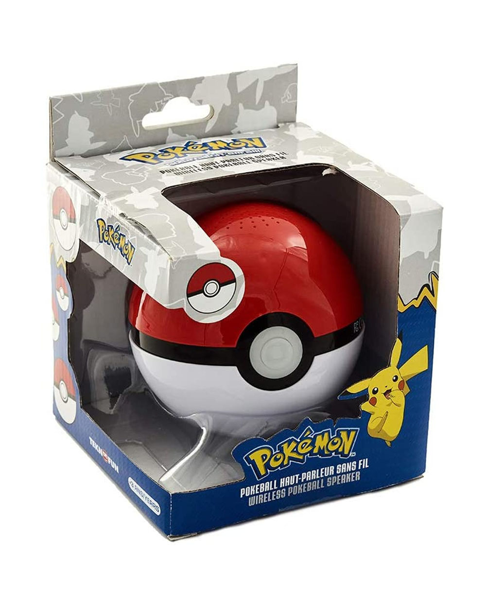 Un altavoz Pokeball de Pokemon en su caja. El altavoz es rojo, blanco y negro. La caja es azul y blanca con Pikachu.