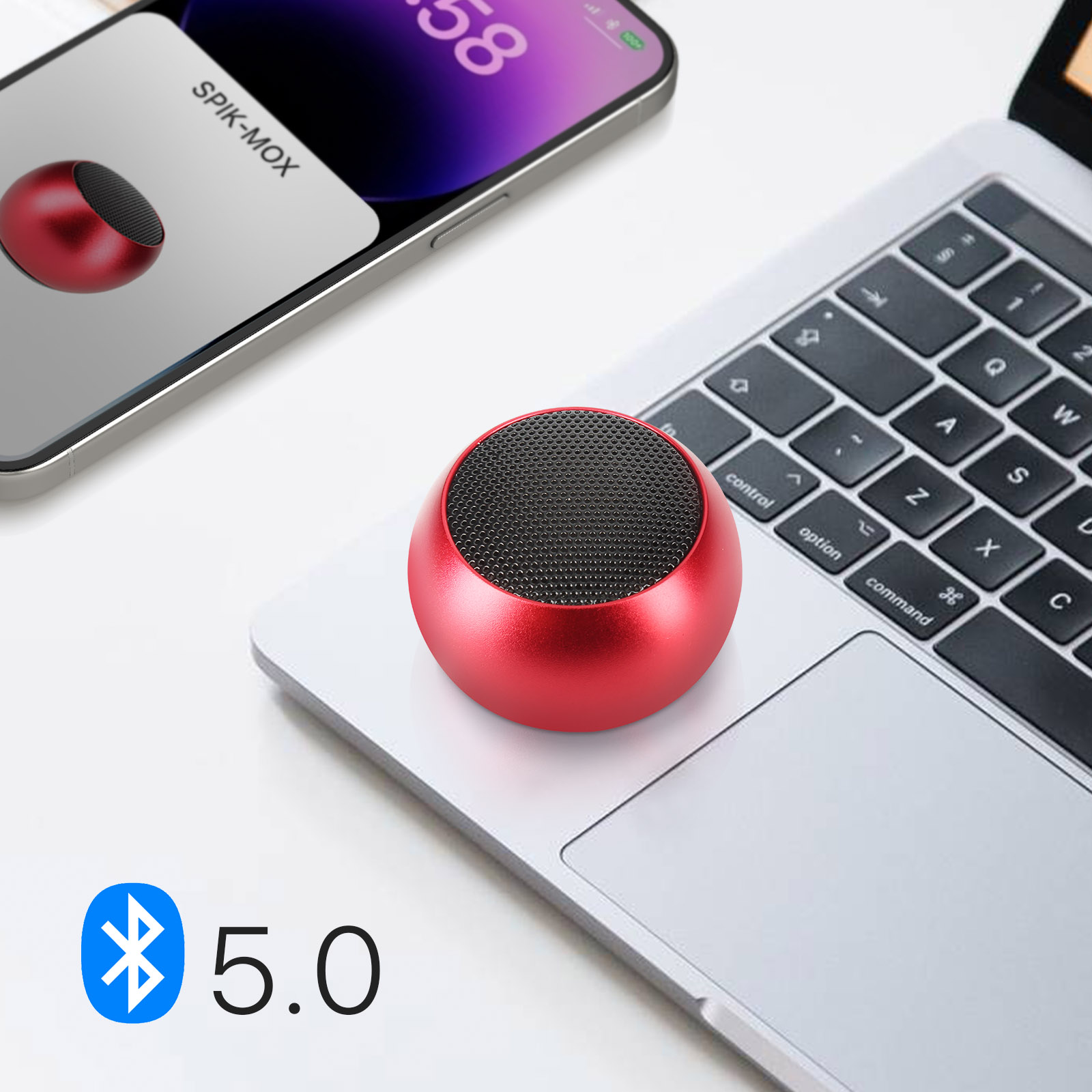 Un altoparlante rosso è su un laptop. Un telefono mostra l'immagine dell'altoparlante. Viene mostrato anche il Bluetooth 5.0.