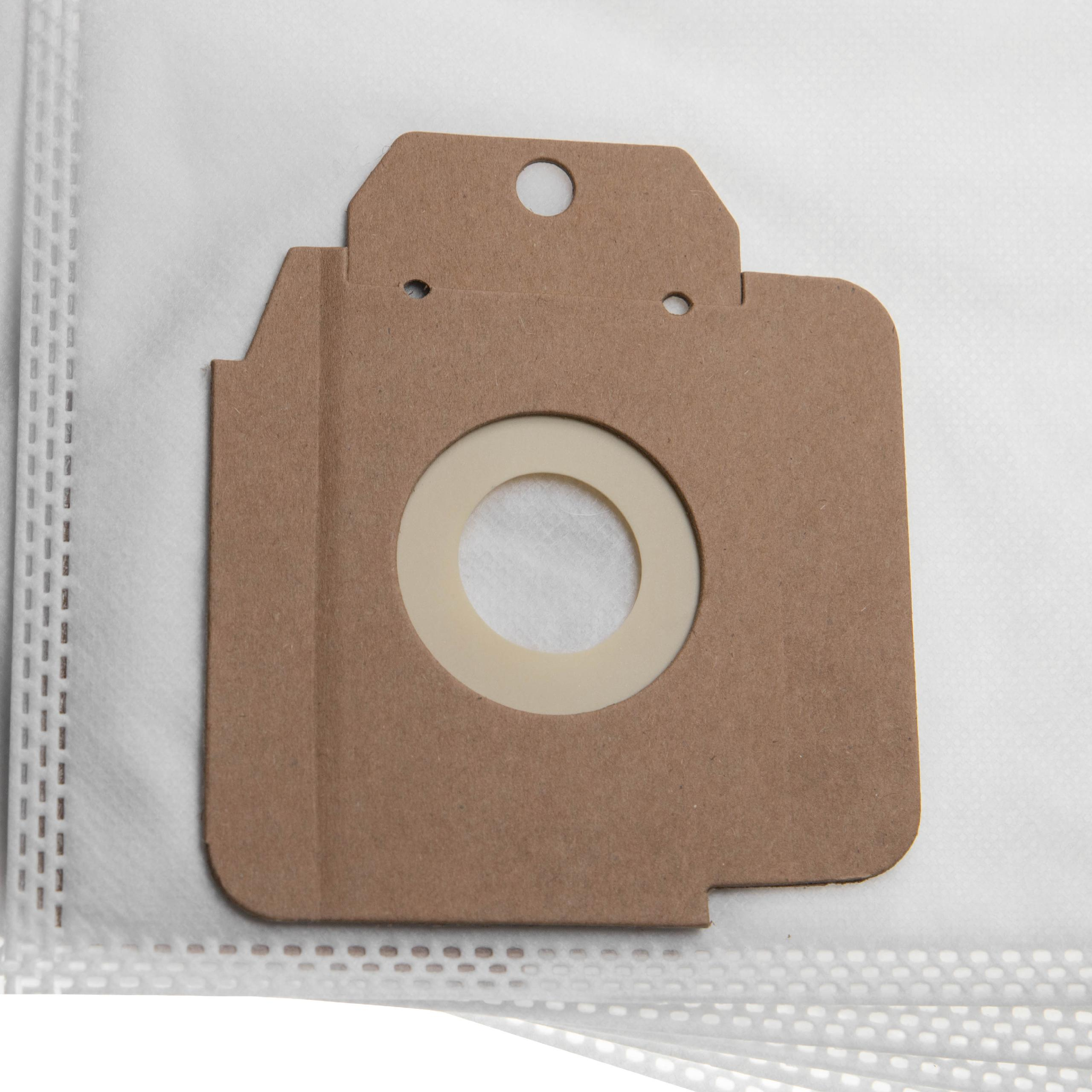Ein brauner Staubsaugerbeutel mit beigem Ring und Loch. Es liegt auf einem weißen Filtermaterial. Draufsicht, Studiobeleuchtung.
