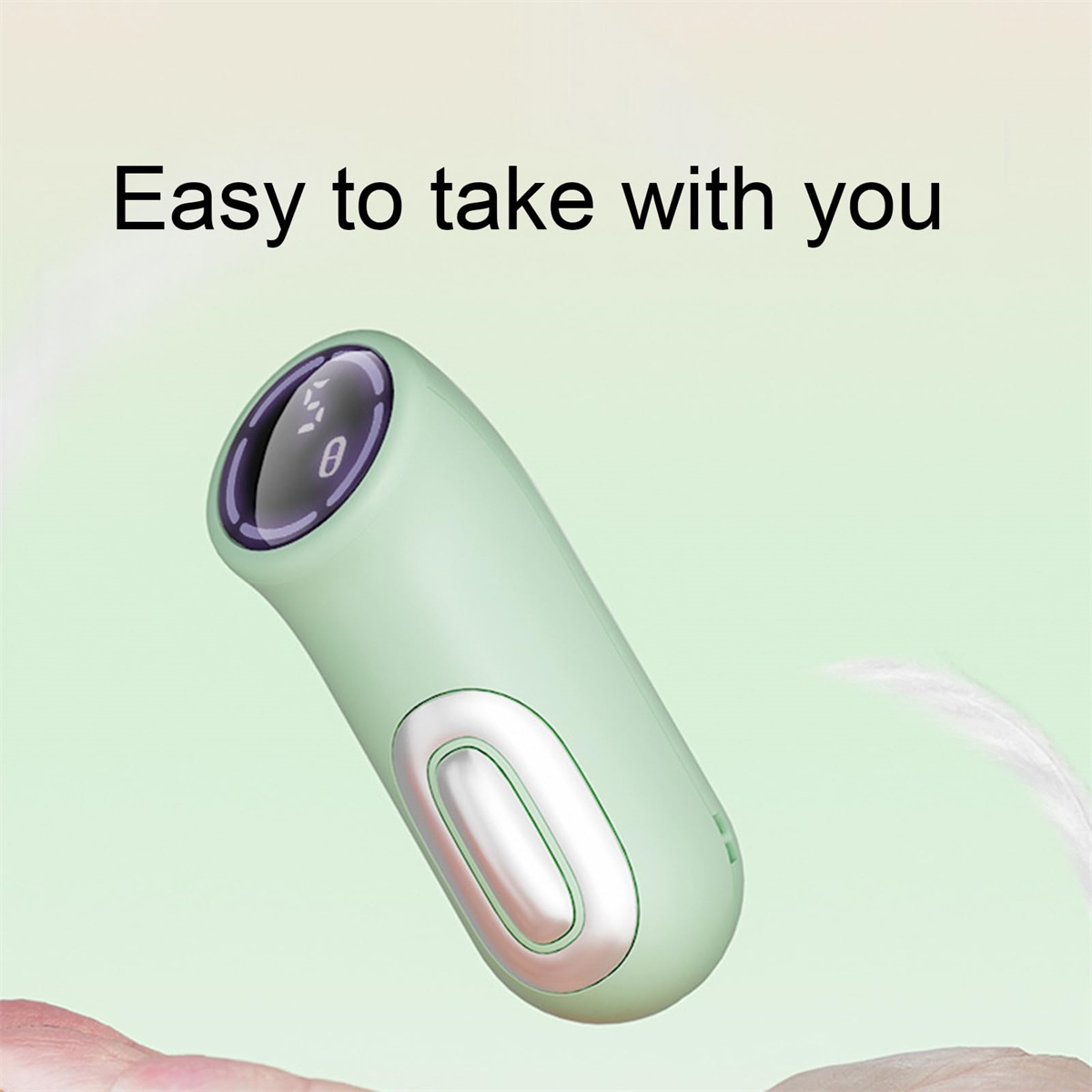 Ein grünes Handgerät mit Display. Text: 'Easy to take with you'. Hintergrund hellgrün.