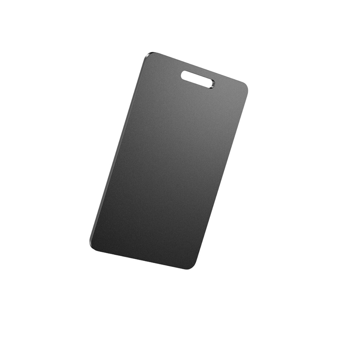 A black rectangular object with a handle hole at the top. It is slightly tilted against a white background.