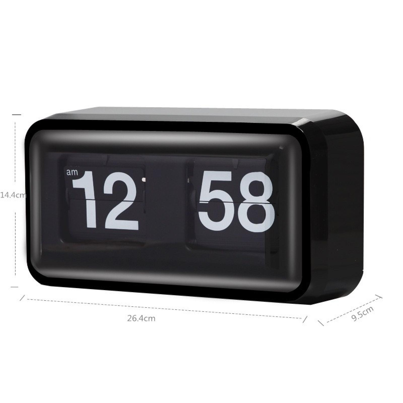 Eine schwarze Klappuhr zeigt 12:58 Uhr morgens an. Die Uhr ist rechteckig mit weißen Ziffern und schwarzem Hintergrund.