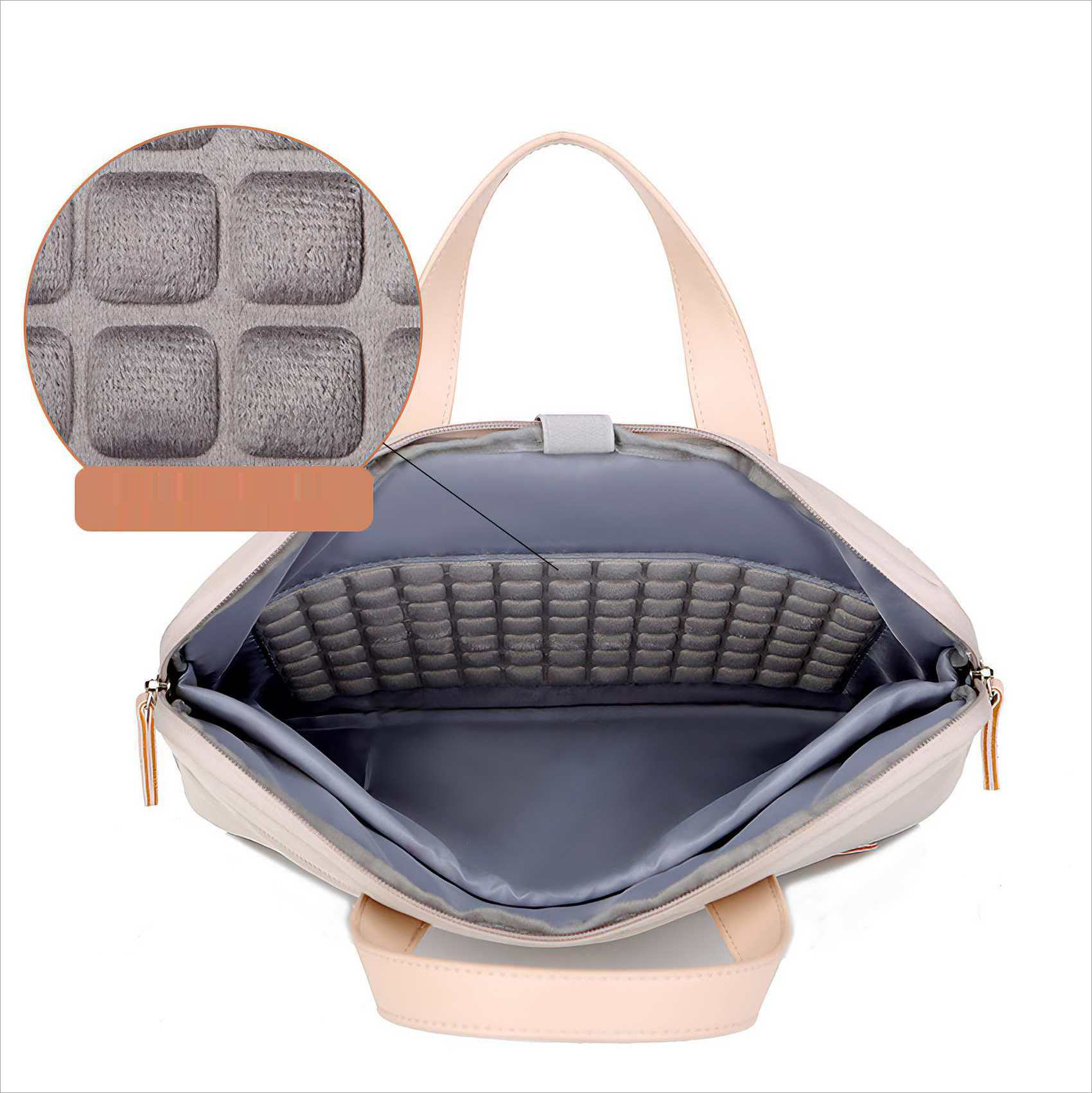 Offene, pfirsichfarbene Laptoptasche. Innenraum hat ein grau gepolstertes Fach und ein graues Innenfutter. Griffe und Reißverschluss sind sichtbar.