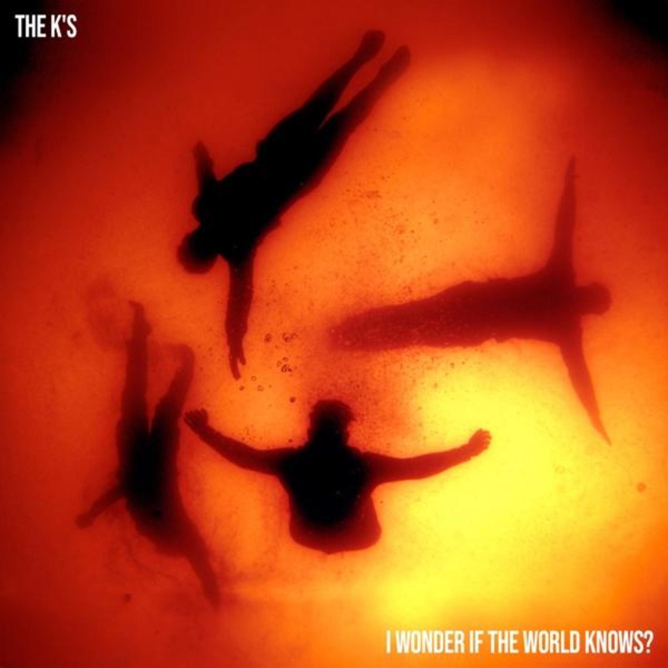 Figure silhouettate su sfondo rosso-arancio. Testo 'The K's' in alto e la domanda 'I wonder if the world knows?' in basso.