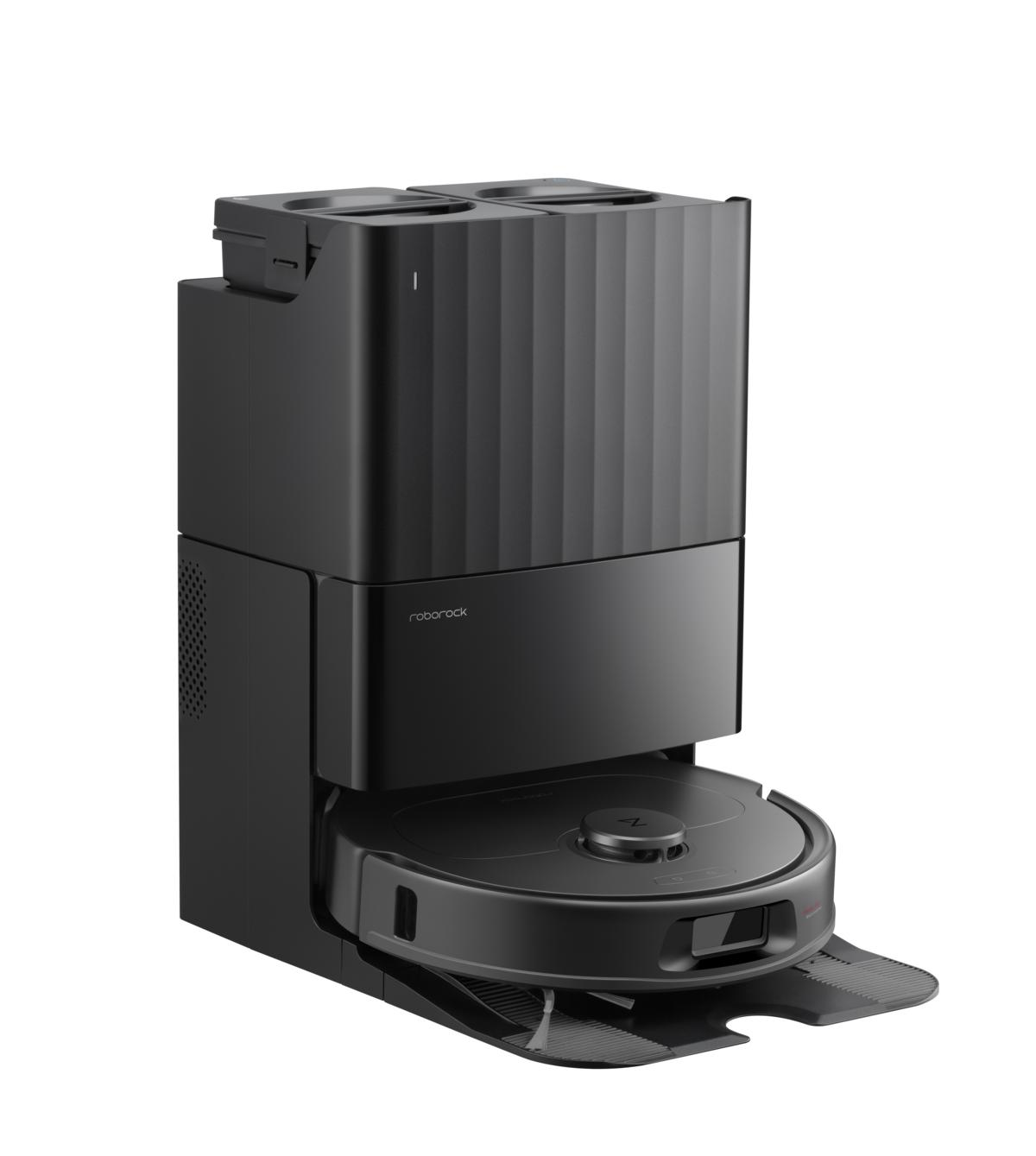 Czarny robot odkurzający Roborock i jego stacja ładująca. Odkurzacz jest okrągły i ma centralny dysk. Stacja jest prostokątna.
