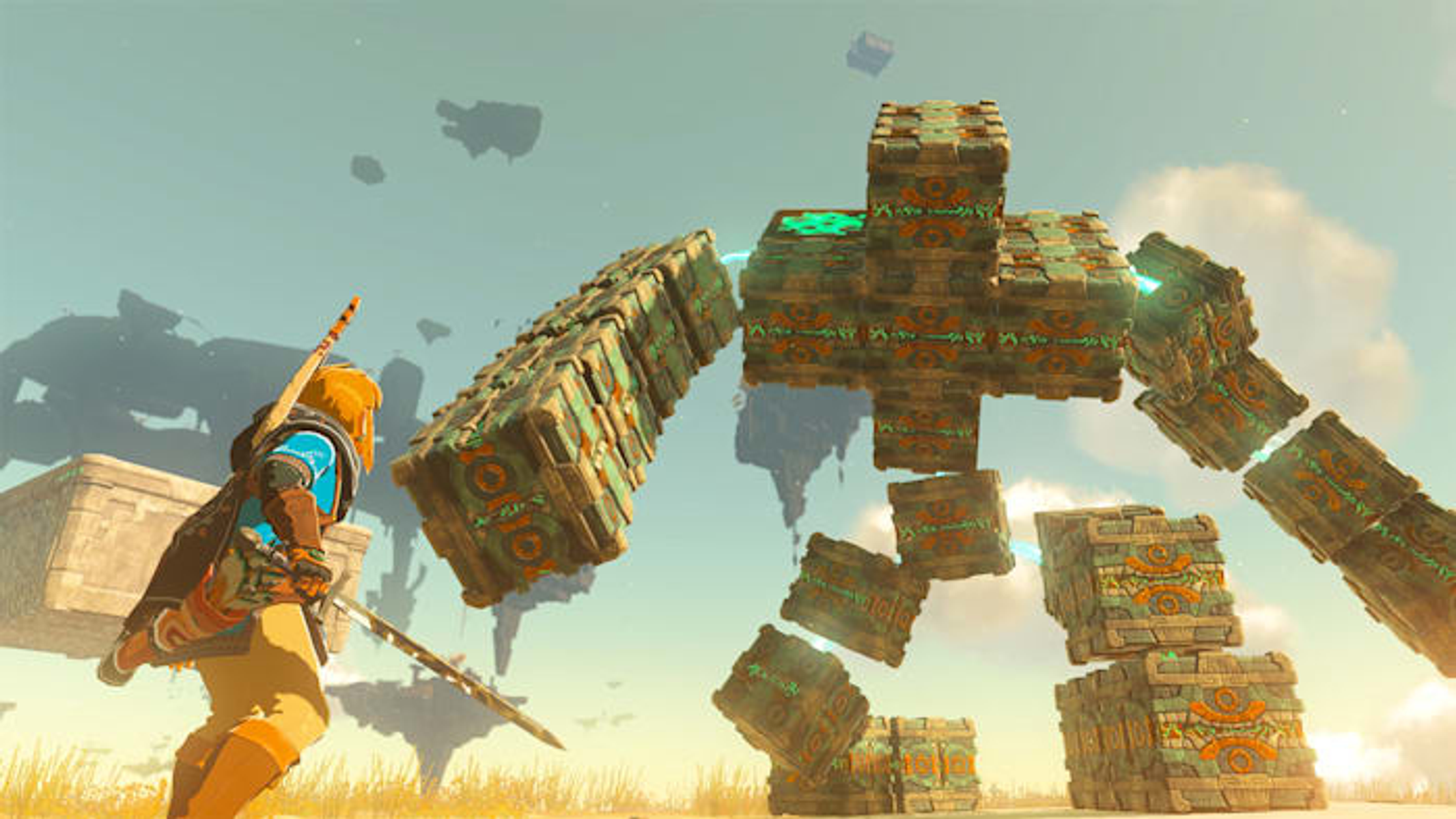 Un personaggio con una spada affronta una struttura gigante a forma di cubo nel cielo. La struttura è composta da blocchi.