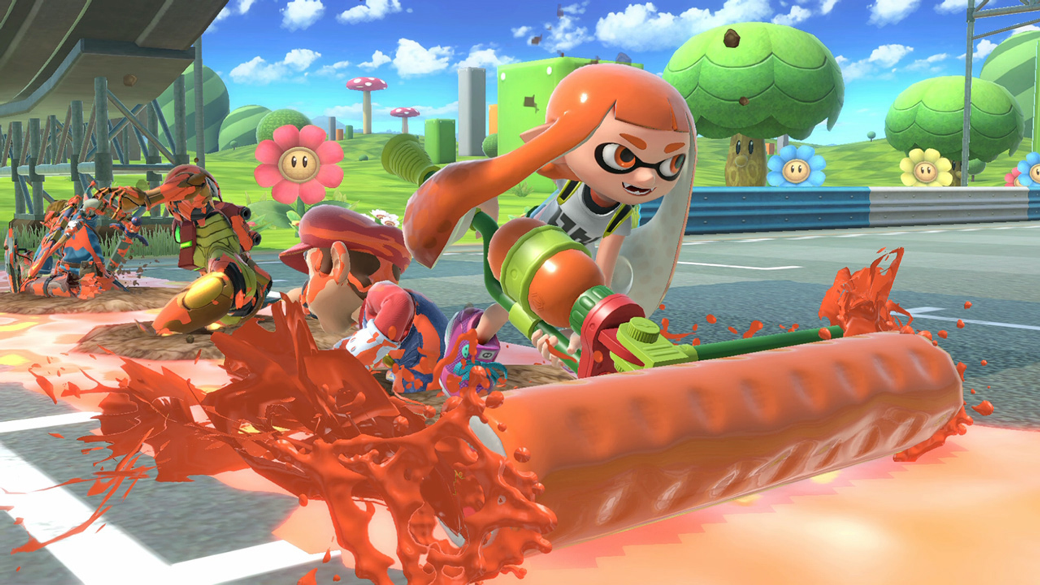 Un personaggio Inkling con un rullo, altri personaggi e una pista da corsa sullo sfondo, spruzzi di inchiostro arancione.
