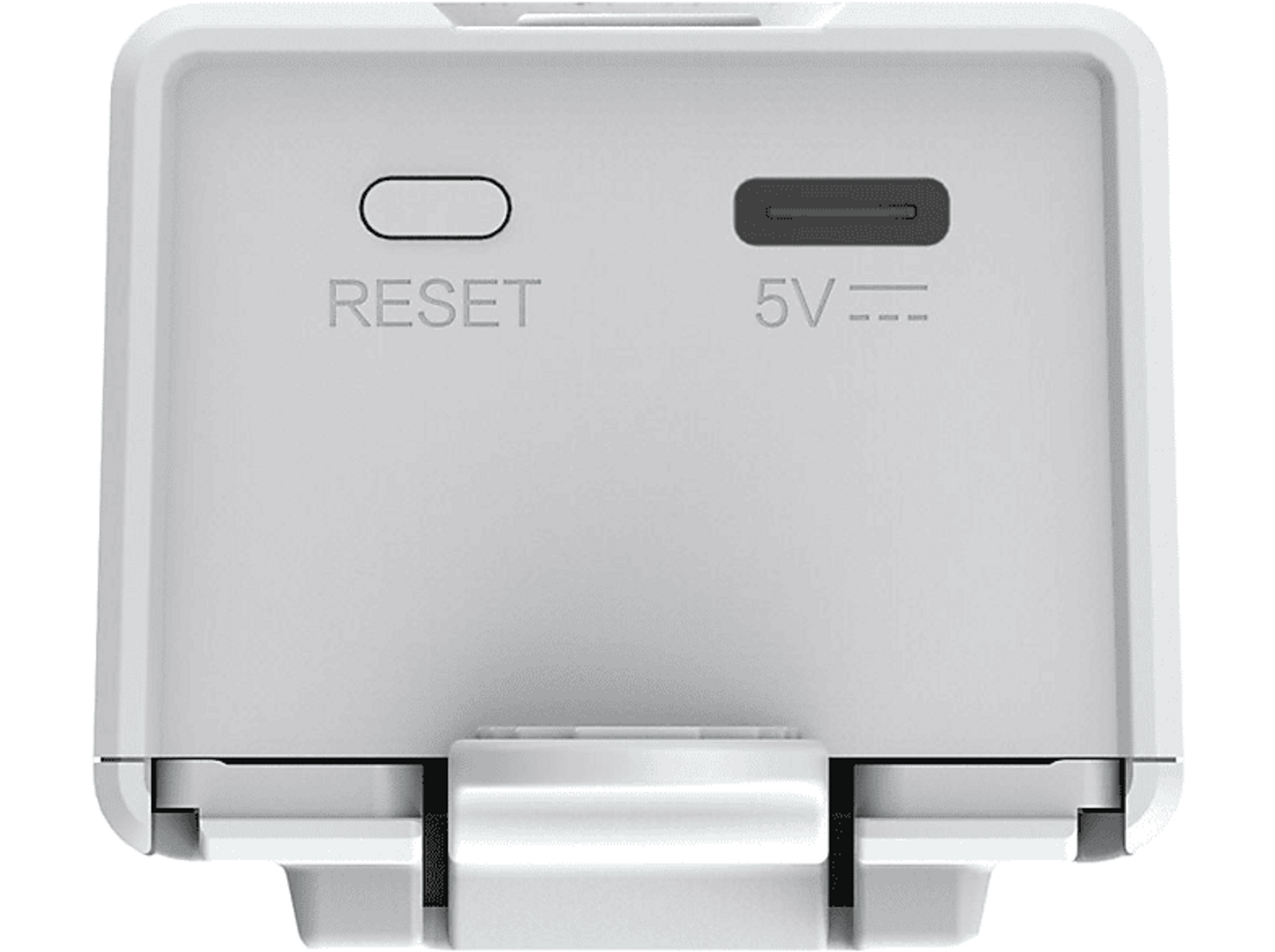 Białe urządzenie z przyciskiem reset, portem USB i oznaczeniem 5V. Prostokątne i z klipsem.