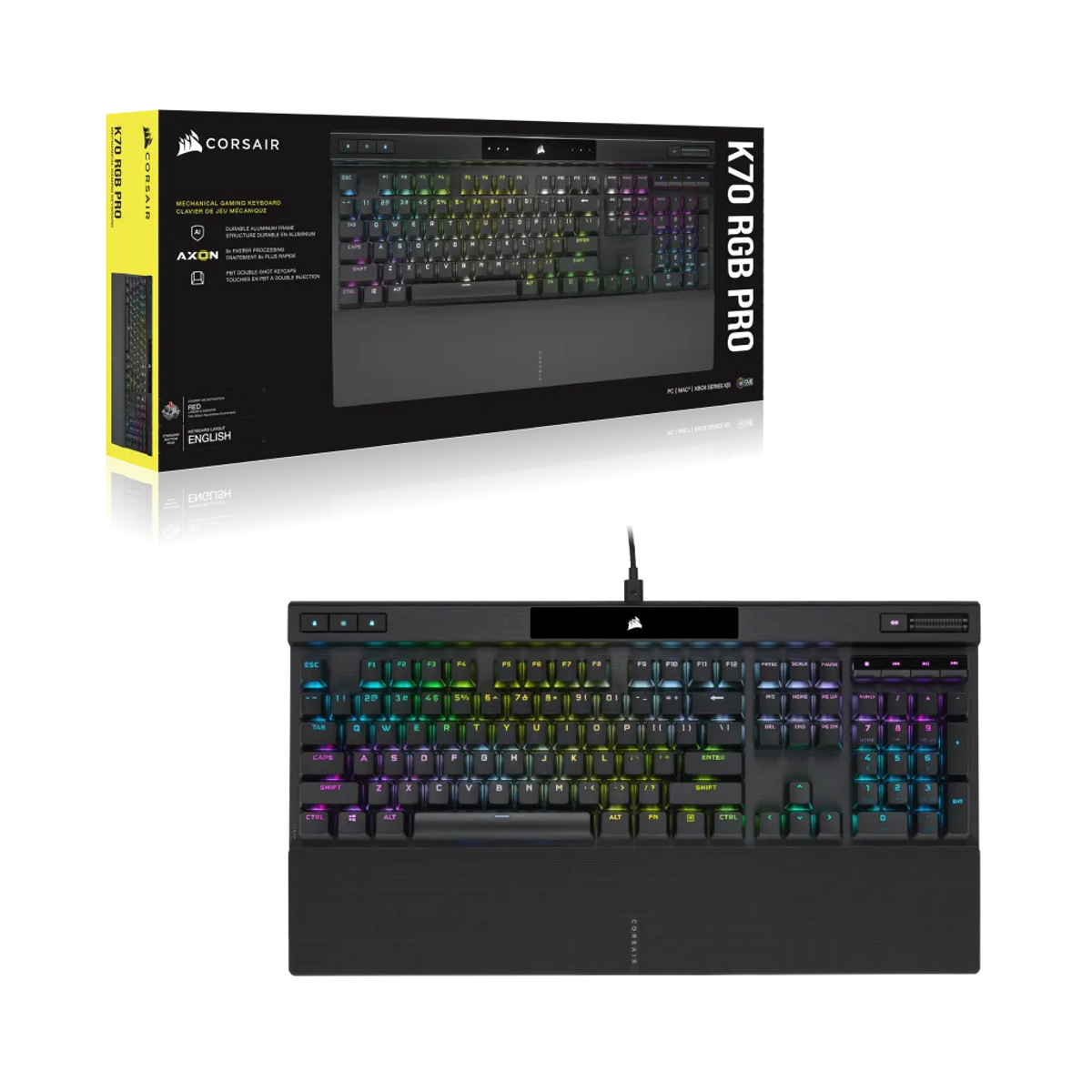 Se muestra un teclado negro Corsair K70 RGB Pro, junto con su caja. El teclado tiene teclas iluminadas de colores y un cable conectado.