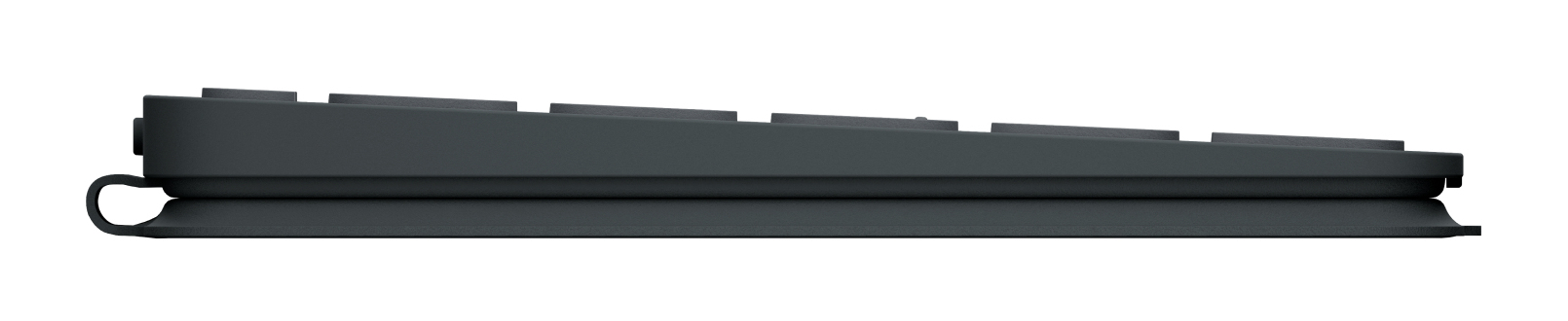 Vue latérale d'un clavier gris foncé. Les touches sont visibles en haut, le corps est légèrement courbé.