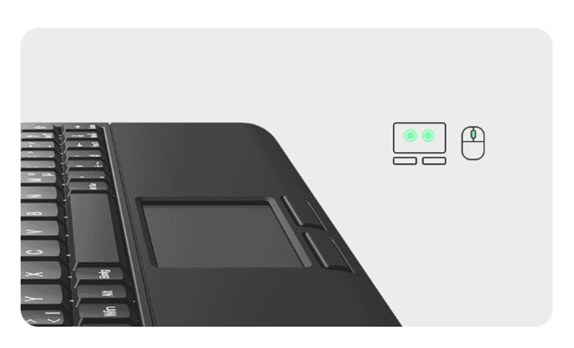 Primer plano de un teclado negro con panel táctil e icono de ratón. Luces verdes en el icono del monitor.