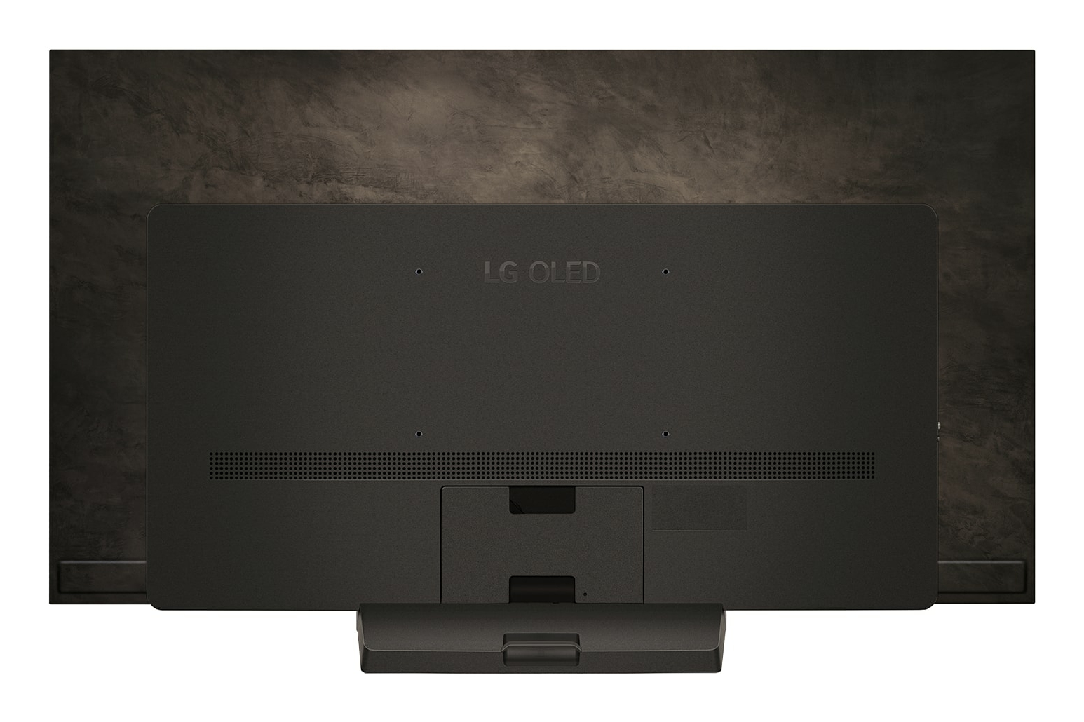 Vista trasera de un televisor LG OLED. El televisor es negro, con el logotipo de LG OLED. El fondo es una superficie texturizada marrón oscuro.