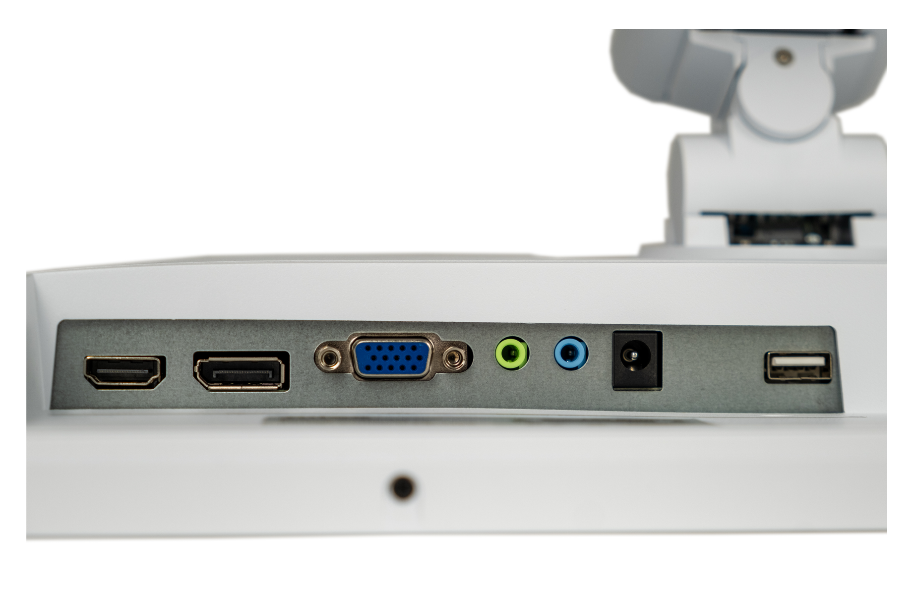 Zbliżenie tylnego panelu monitora z różnymi portami: HDMI, VGA, audio i USB. Monitor jest biały z szarym metalowym panelem.