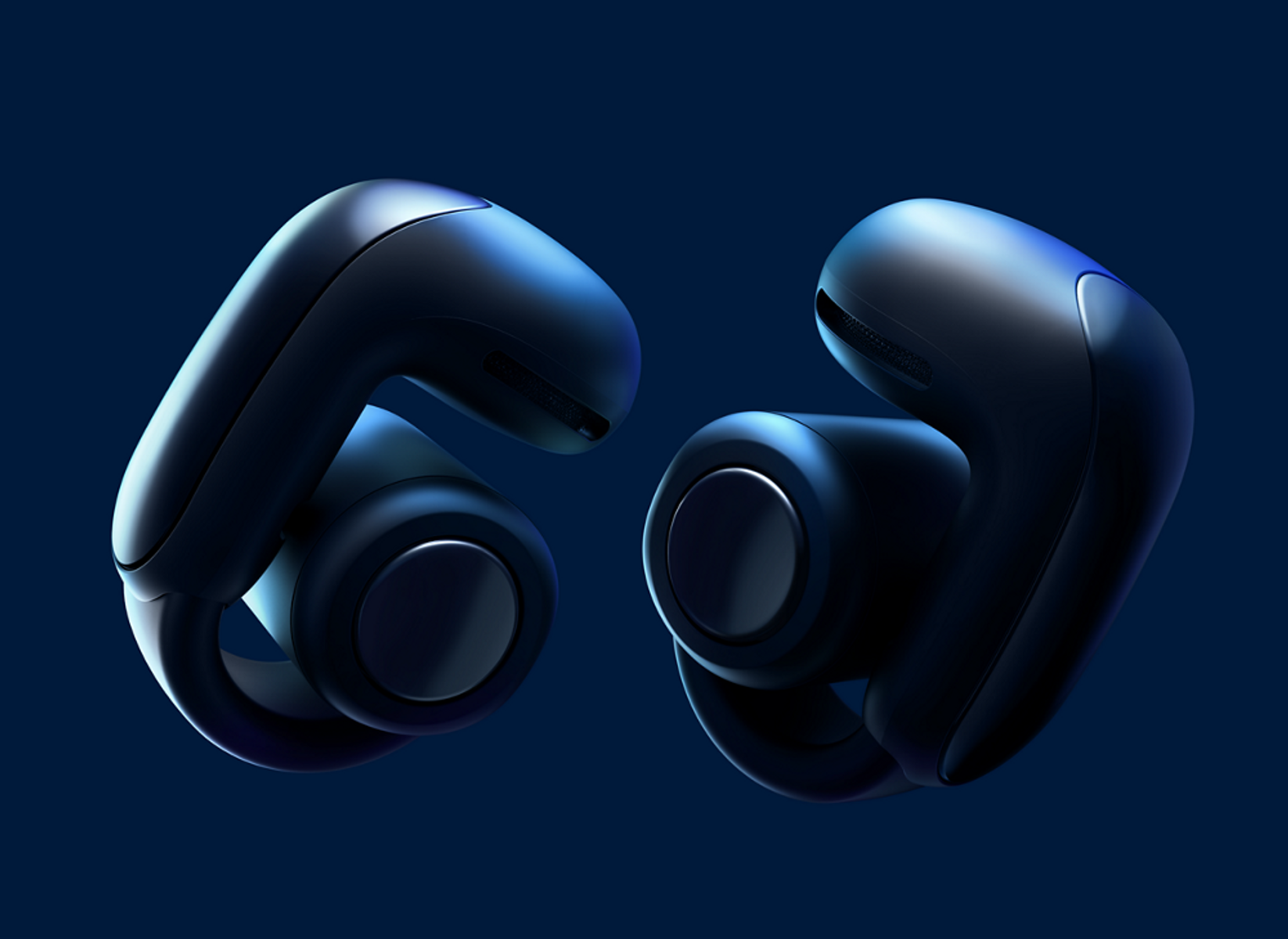 Dwa ciemnoniebieskie, futurystycznie wyglądające słuchawki douszne na ciemnoniebieskim tle gradientowym. Każda słuchawka ma okrągłą część i haczyk na ucho.